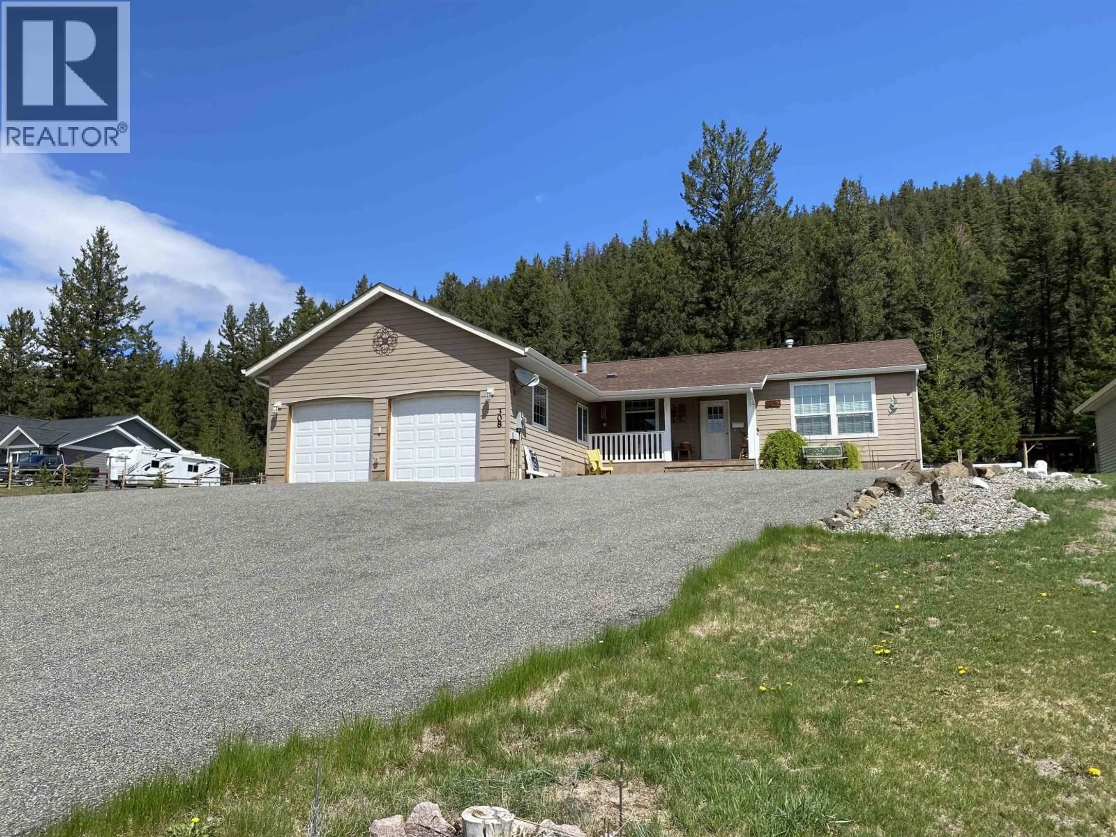 A pic from outside/outdoor area/front of a property/back of a property/a pic from drone, unknown for 308 BLACKSTOCK ROAD, 100 Mile House British Columbia V0K2E1