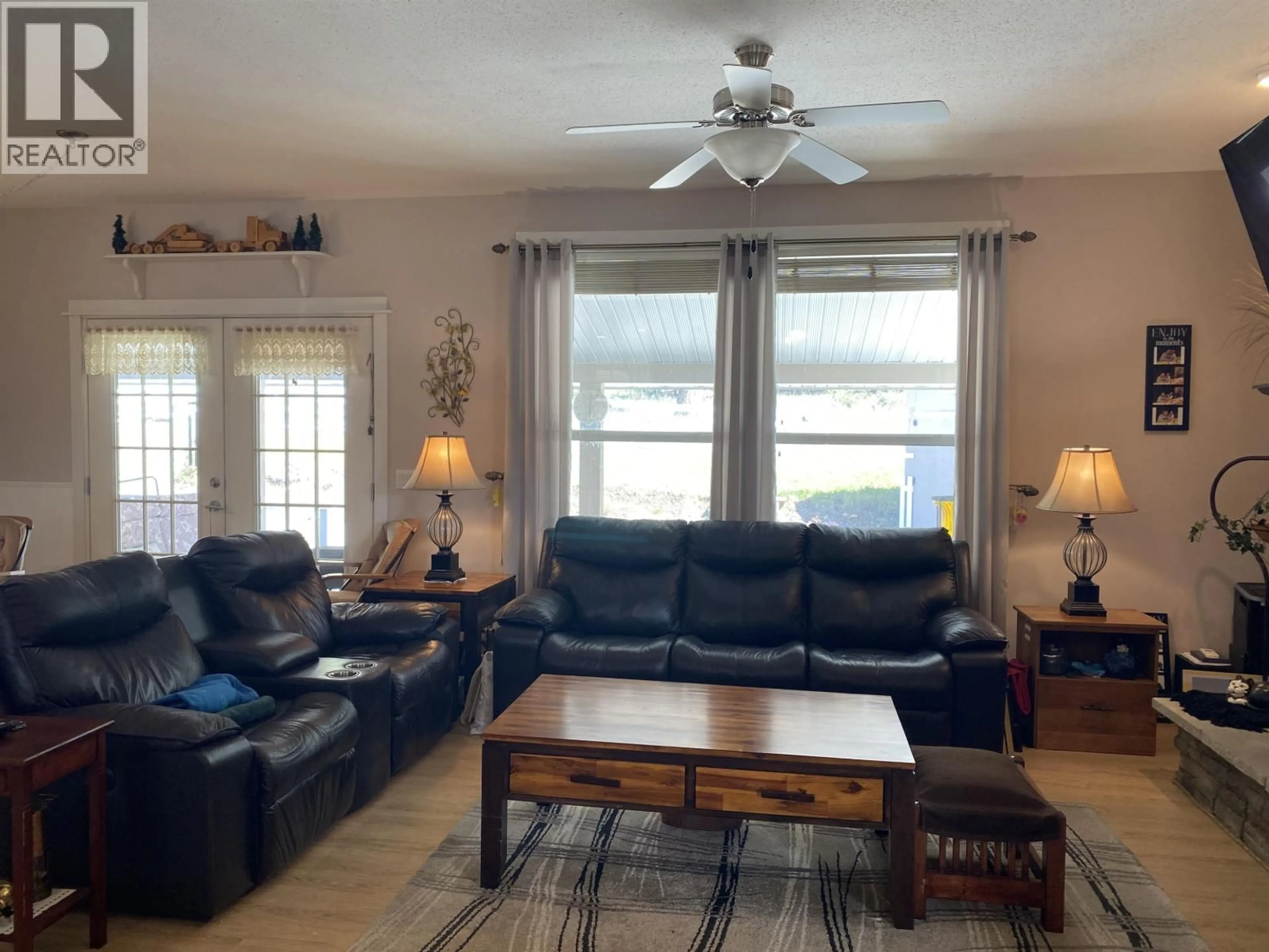 Living room with furniture, unknown for 308 BLACKSTOCK ROAD, 100 Mile House British Columbia V0K2E1