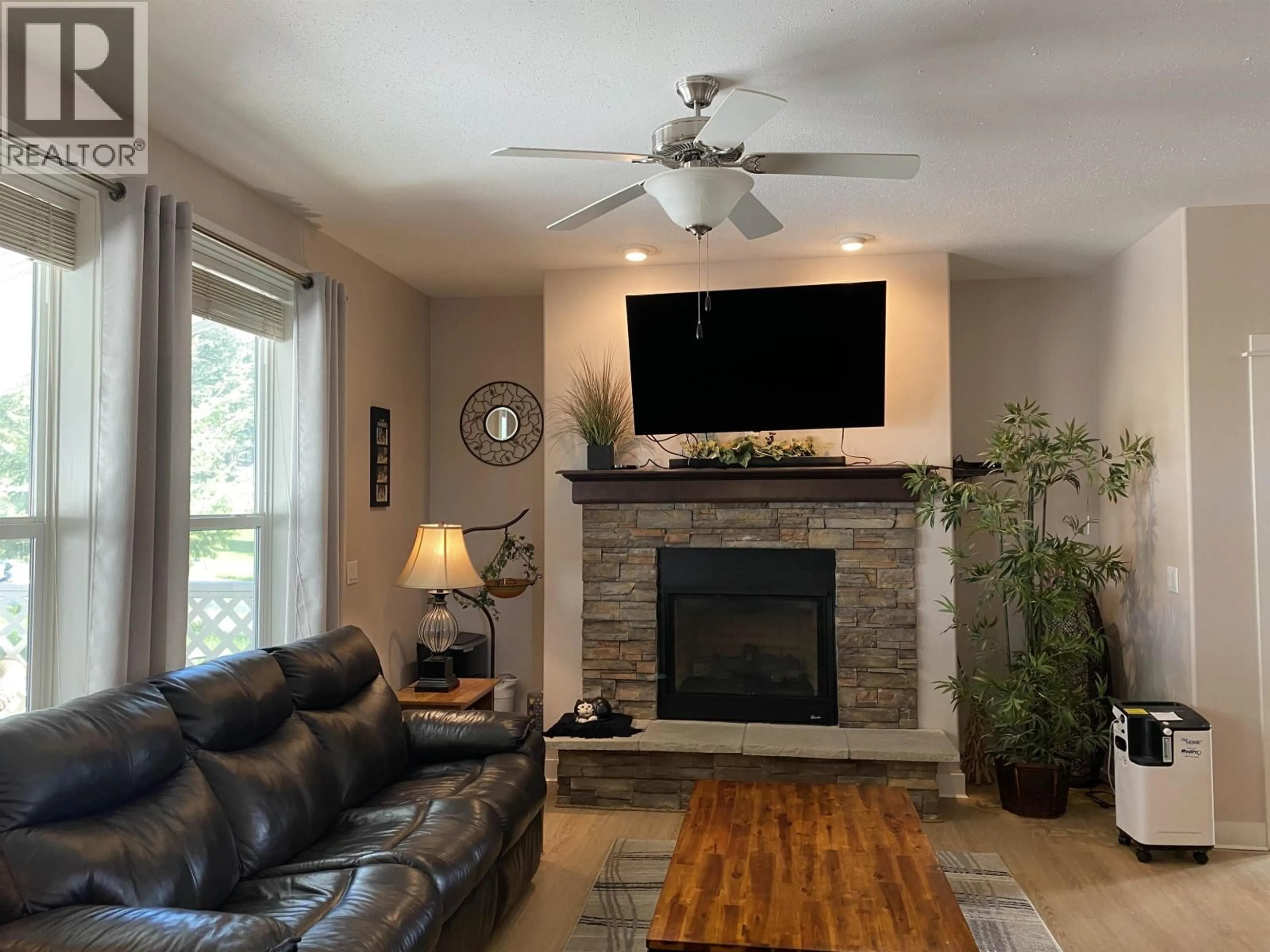 Living room with furniture, unknown for 308 BLACKSTOCK ROAD, 100 Mile House British Columbia V0K2E1