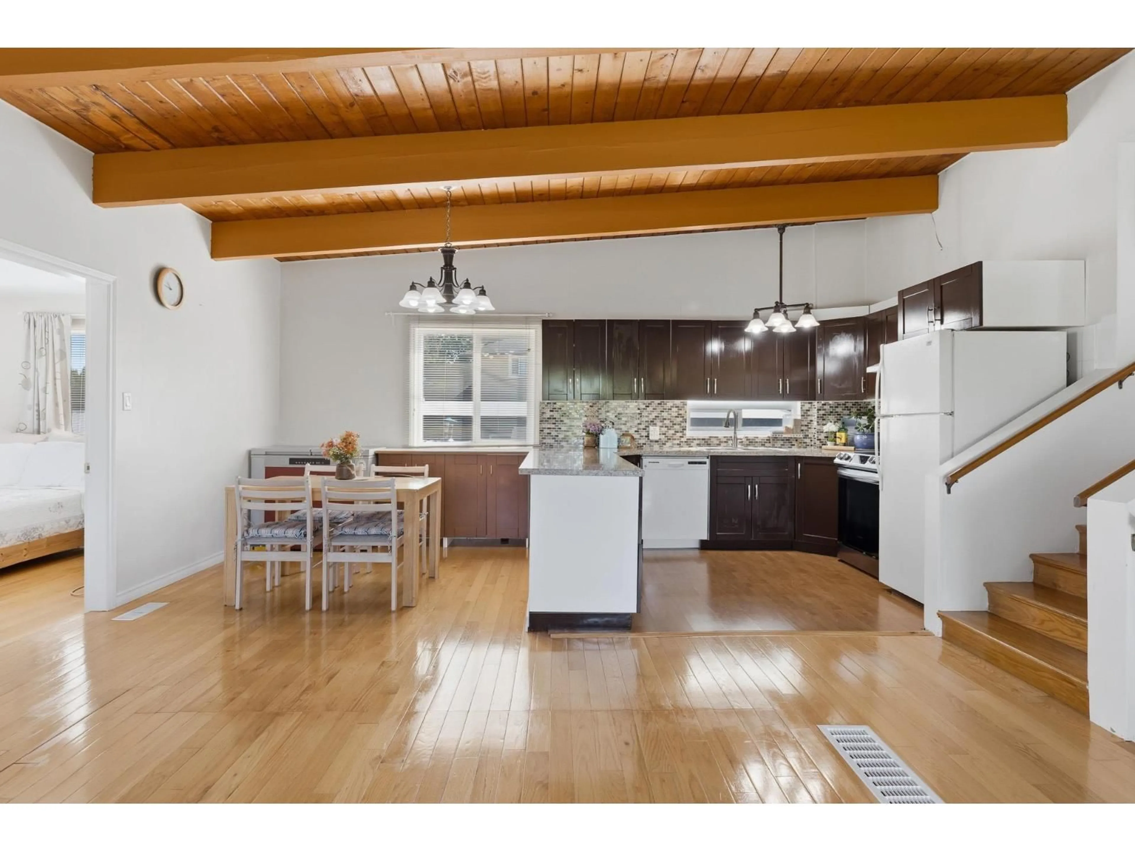 Open concept kitchen, wood/laminate floor for 7495 LEARY CRESCENT, Chilliwack British Columbia V2R3H4