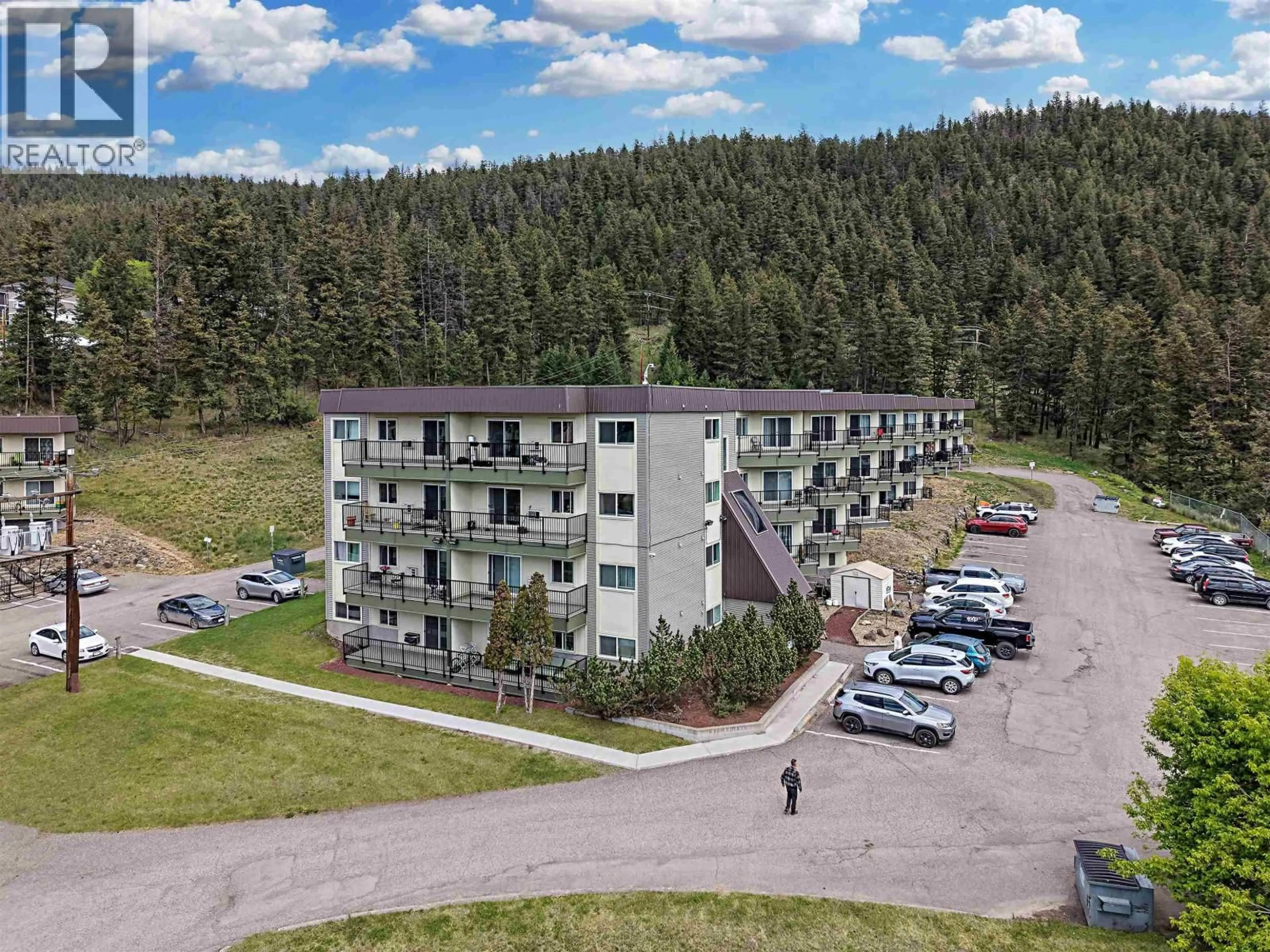 A pic from outside/outdoor area/front of a property/back of a property/a pic from drone, mountain view for 318 - 280 BROADWAY AVENUE, Williams Lake British Columbia V2G4J7
