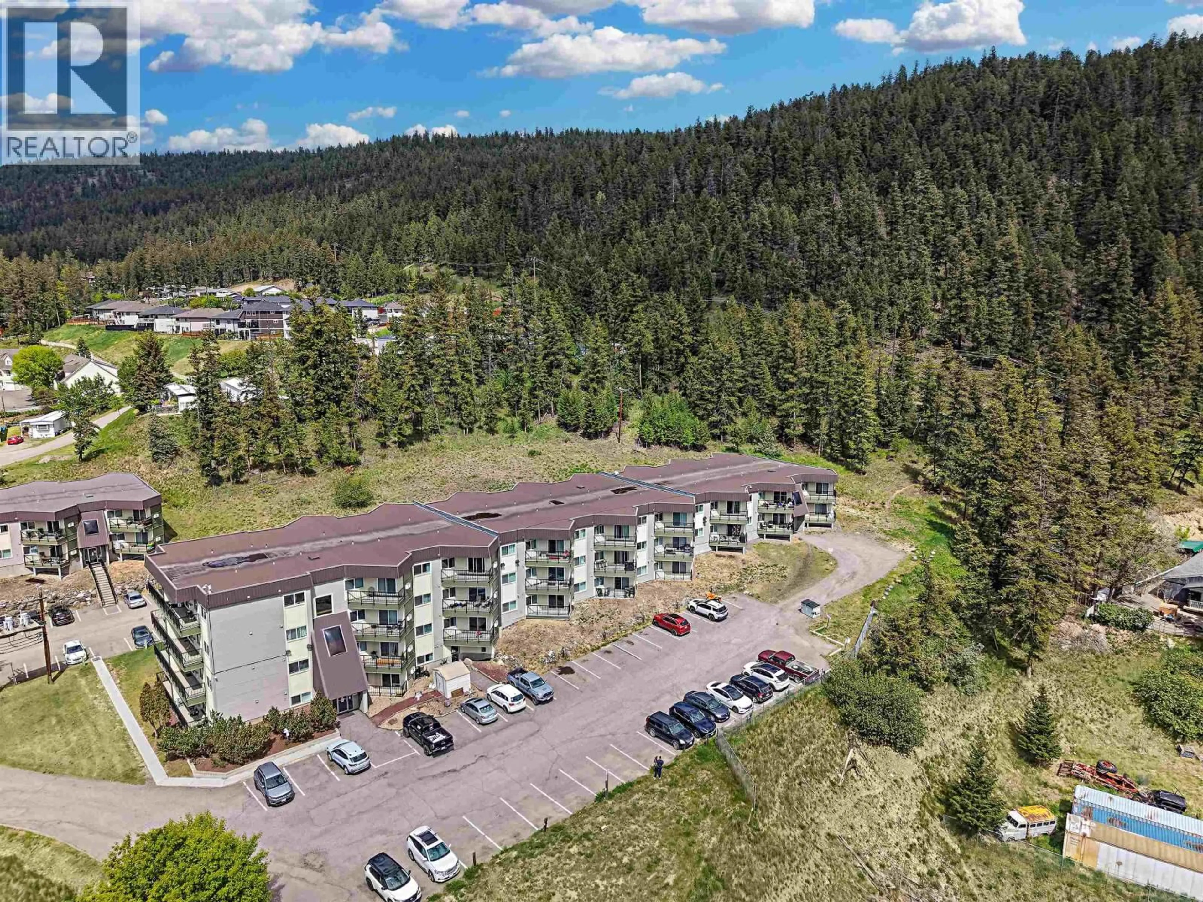A pic from outside/outdoor area/front of a property/back of a property/a pic from drone, mountain view for 318 - 280 BROADWAY AVENUE, Williams Lake British Columbia V2G4J7