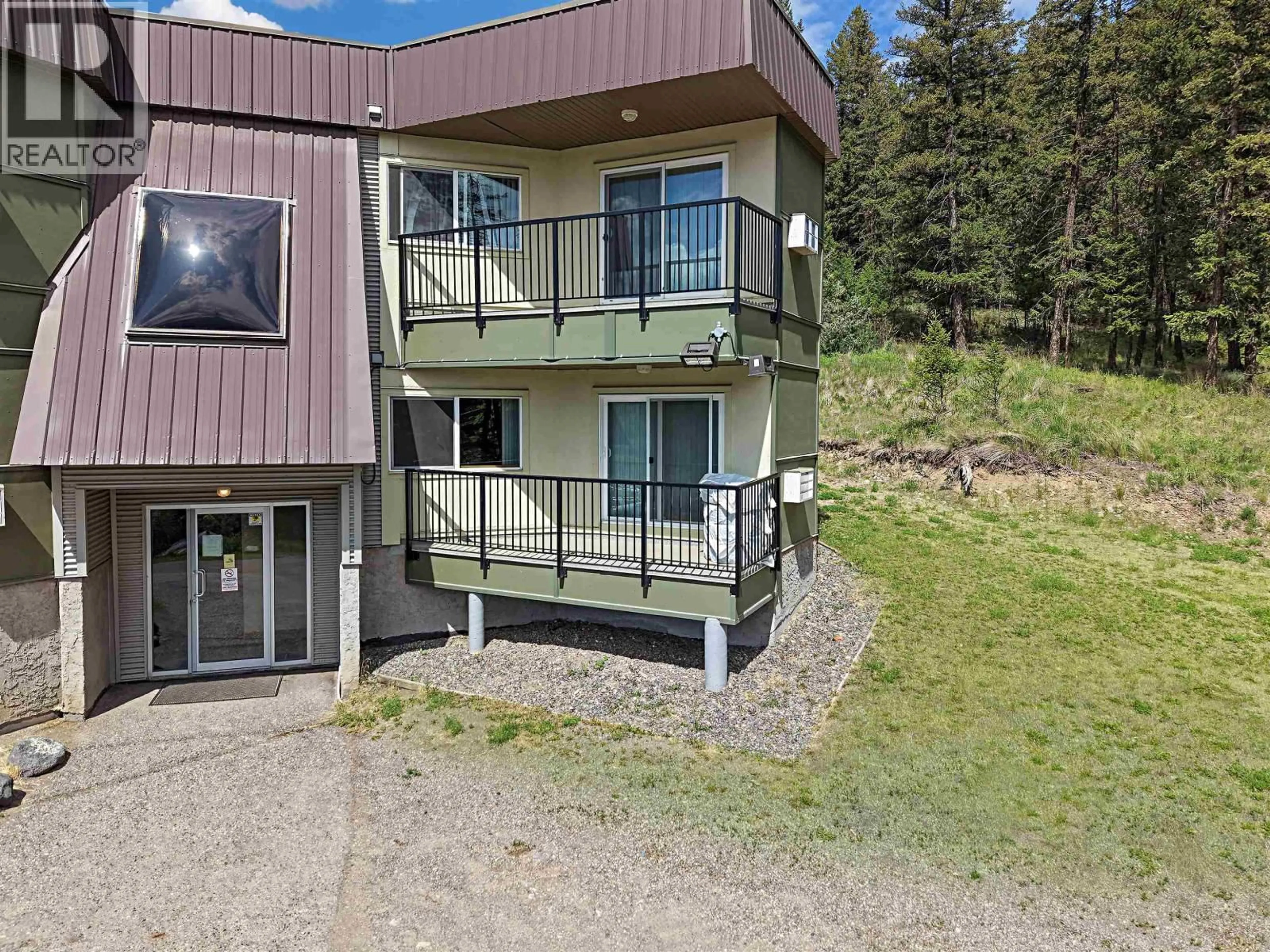 A pic from outside/outdoor area/front of a property/back of a property/a pic from drone, mountain view for 318 - 280 BROADWAY AVENUE, Williams Lake British Columbia V2G4J7