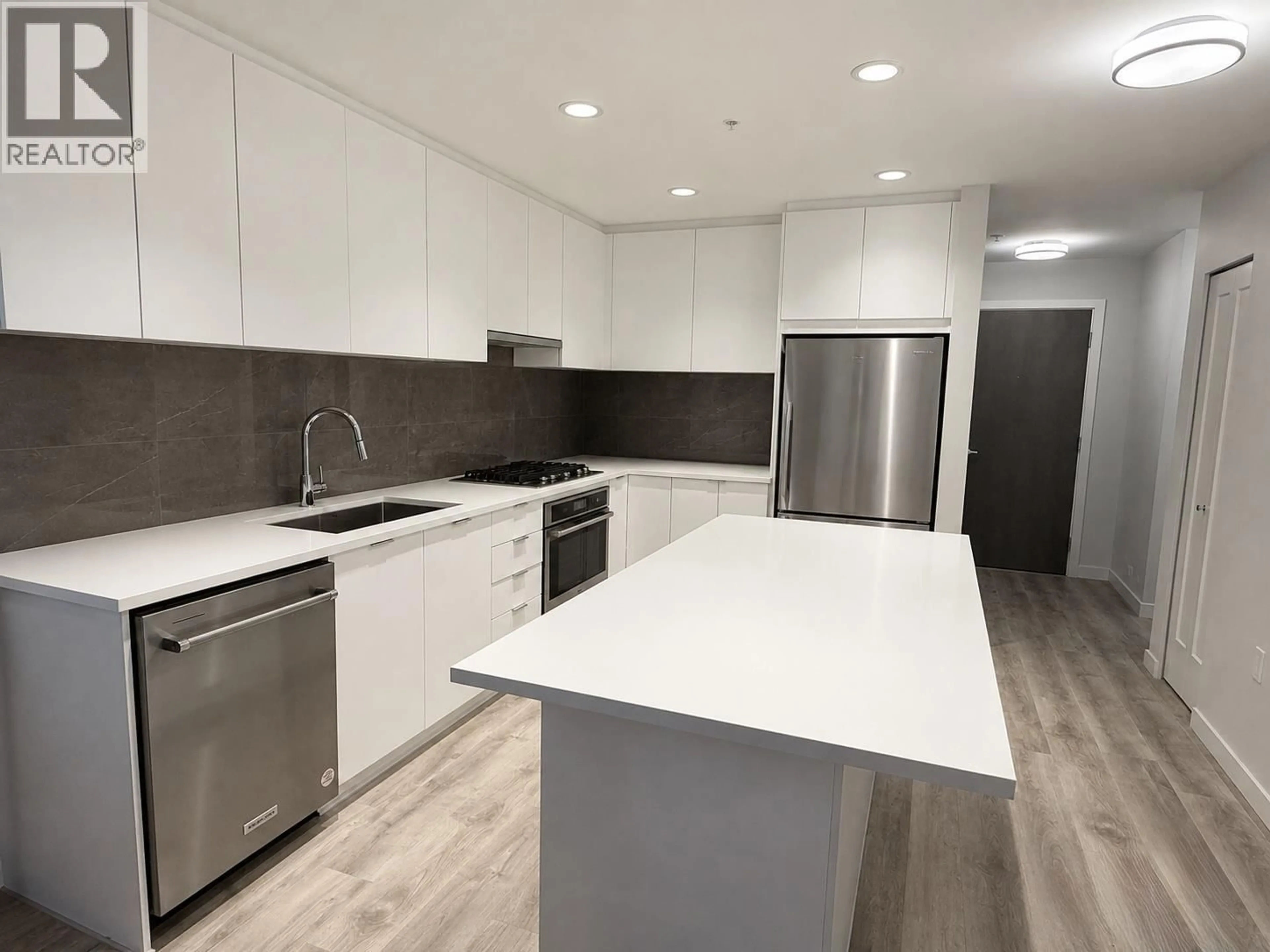 Open concept kitchen, unknown for 204 - 615 COTTONWOOD AVENUE, Coquitlam British Columbia V3J2S5