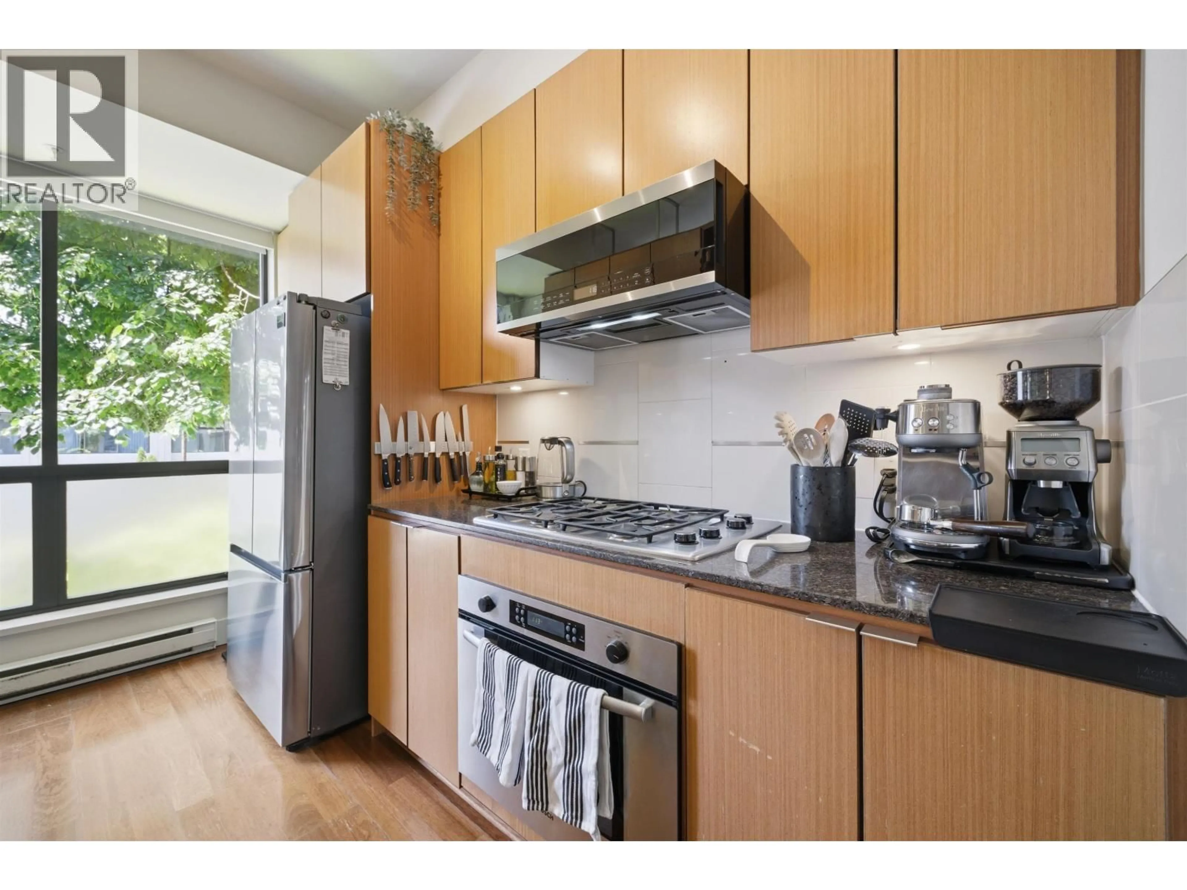 Standard kitchen, wood/laminate floor for 3750 COMMERCIAL STREET, Vancouver British Columbia V5N4G2