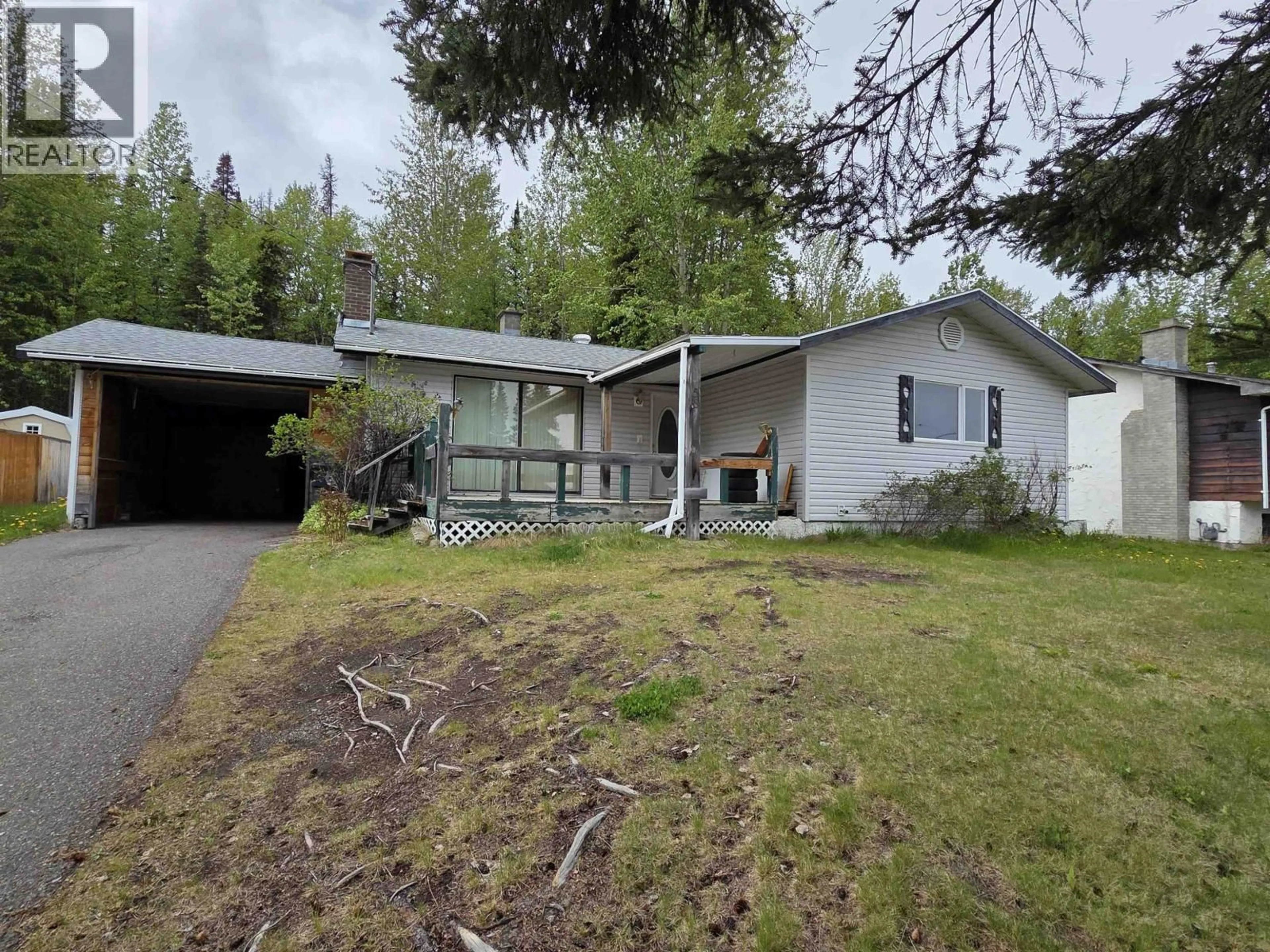 A pic from outside/outdoor area/front of a property/back of a property/a pic from drone, unknown for 58 FULTON STREET, Granisle British Columbia V0J1W0