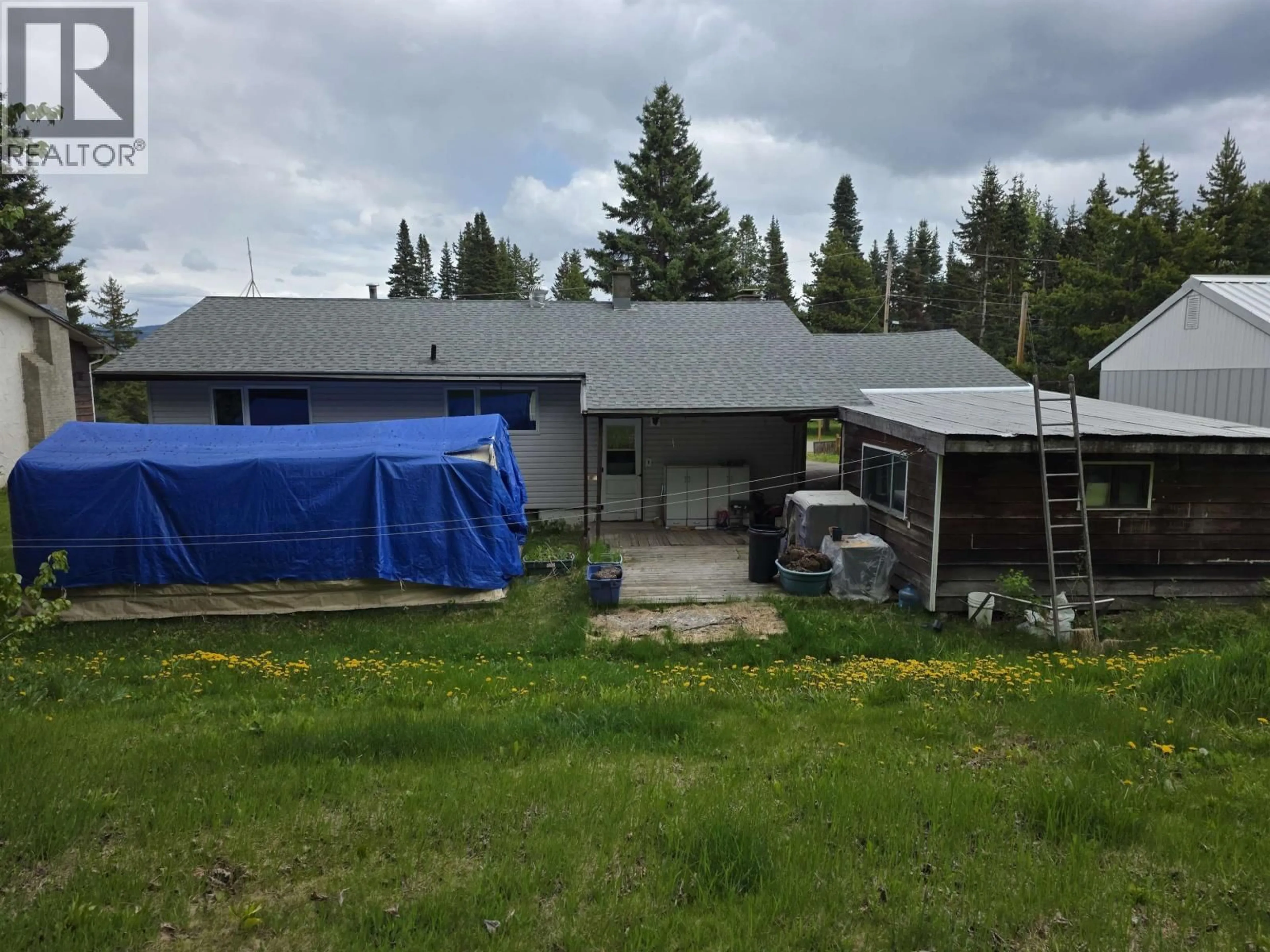 A pic from outside/outdoor area/front of a property/back of a property/a pic from drone, building for 58 FULTON STREET, Granisle British Columbia V0J1W0