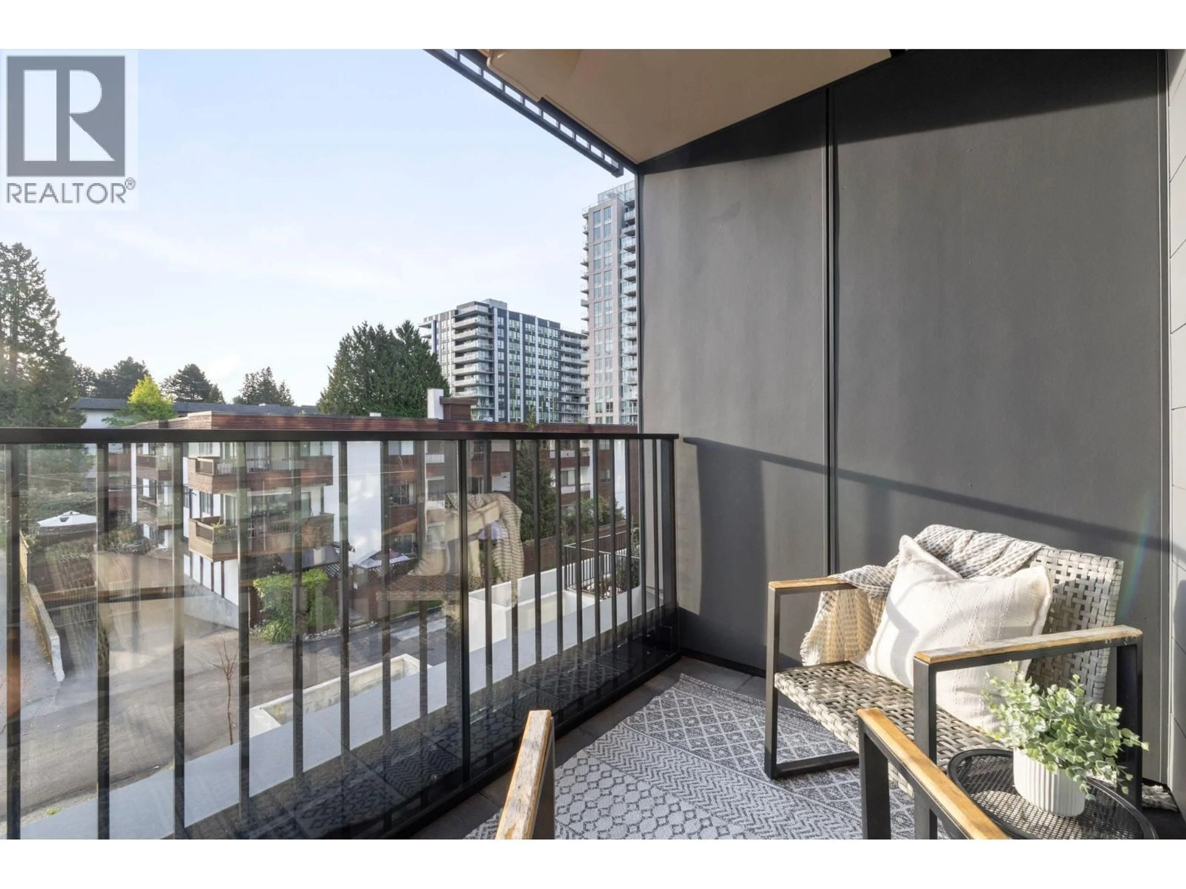 Balcony in the apartment, city buildings view from balcony for 312 - 110 17TH STREET, North Vancouver British Columbia V7L2V5
