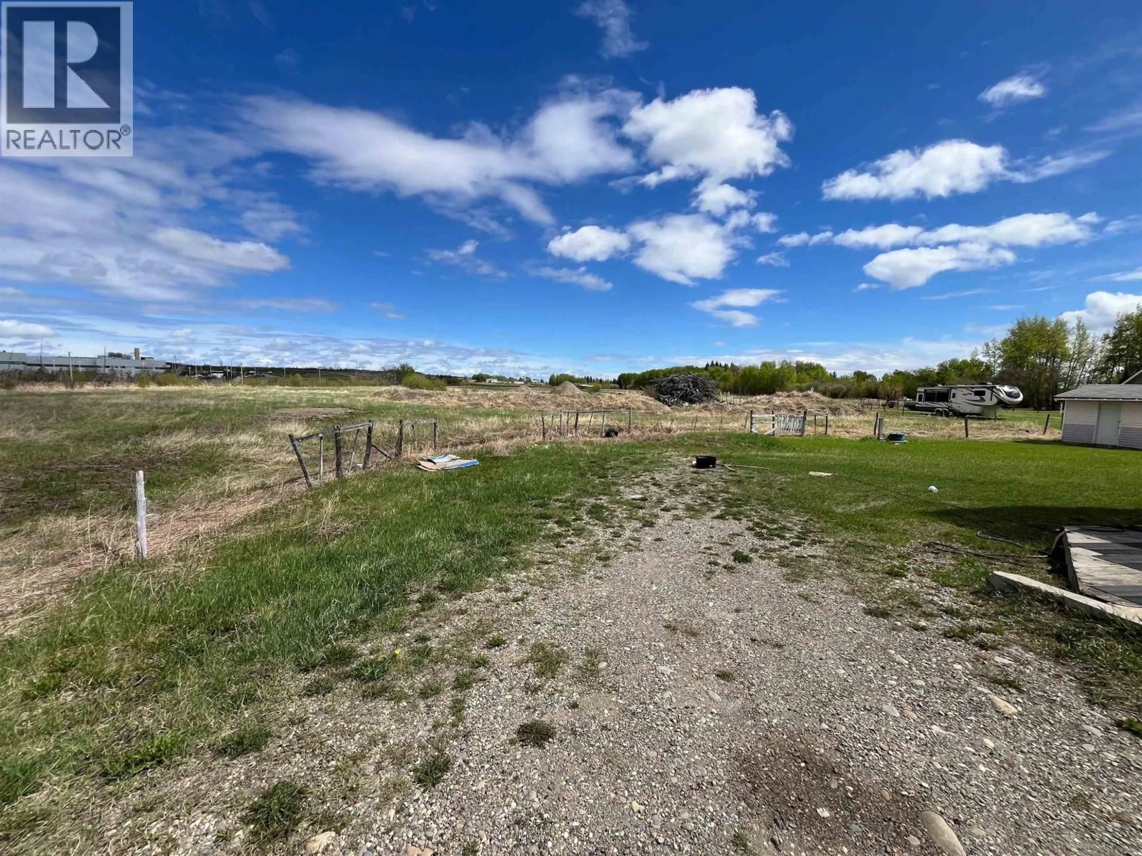 A pic from outside/outdoor area/front of a property/back of a property/a pic from drone, unknown for 10763 86 STREET, Fort St. John British Columbia V1J8E4