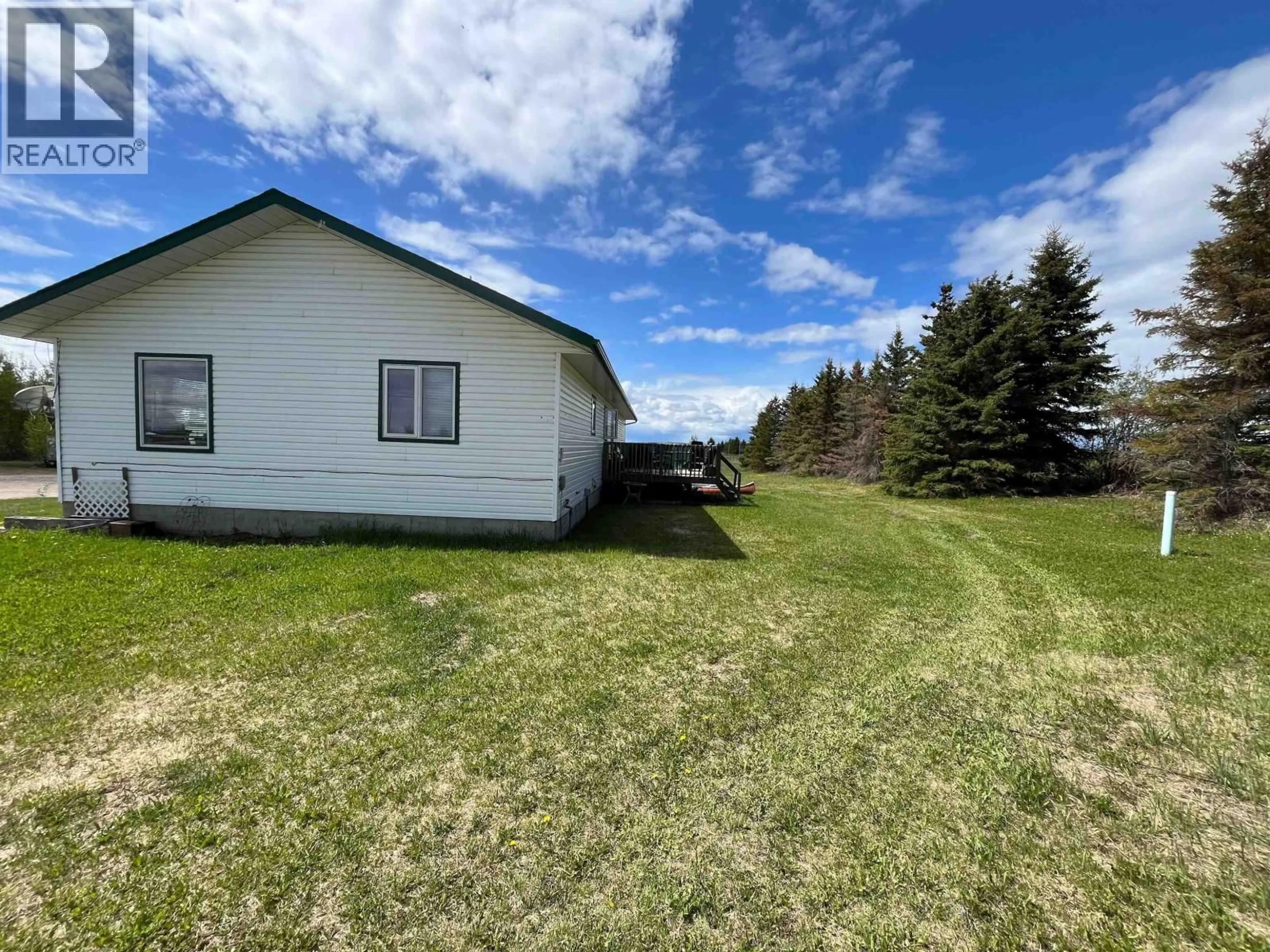 A pic from outside/outdoor area/front of a property/back of a property/a pic from drone, water/lake/river/ocean view for 10720 NORTHERN LIGHTS DRIVE, Fort St. John British Columbia V1J0S8