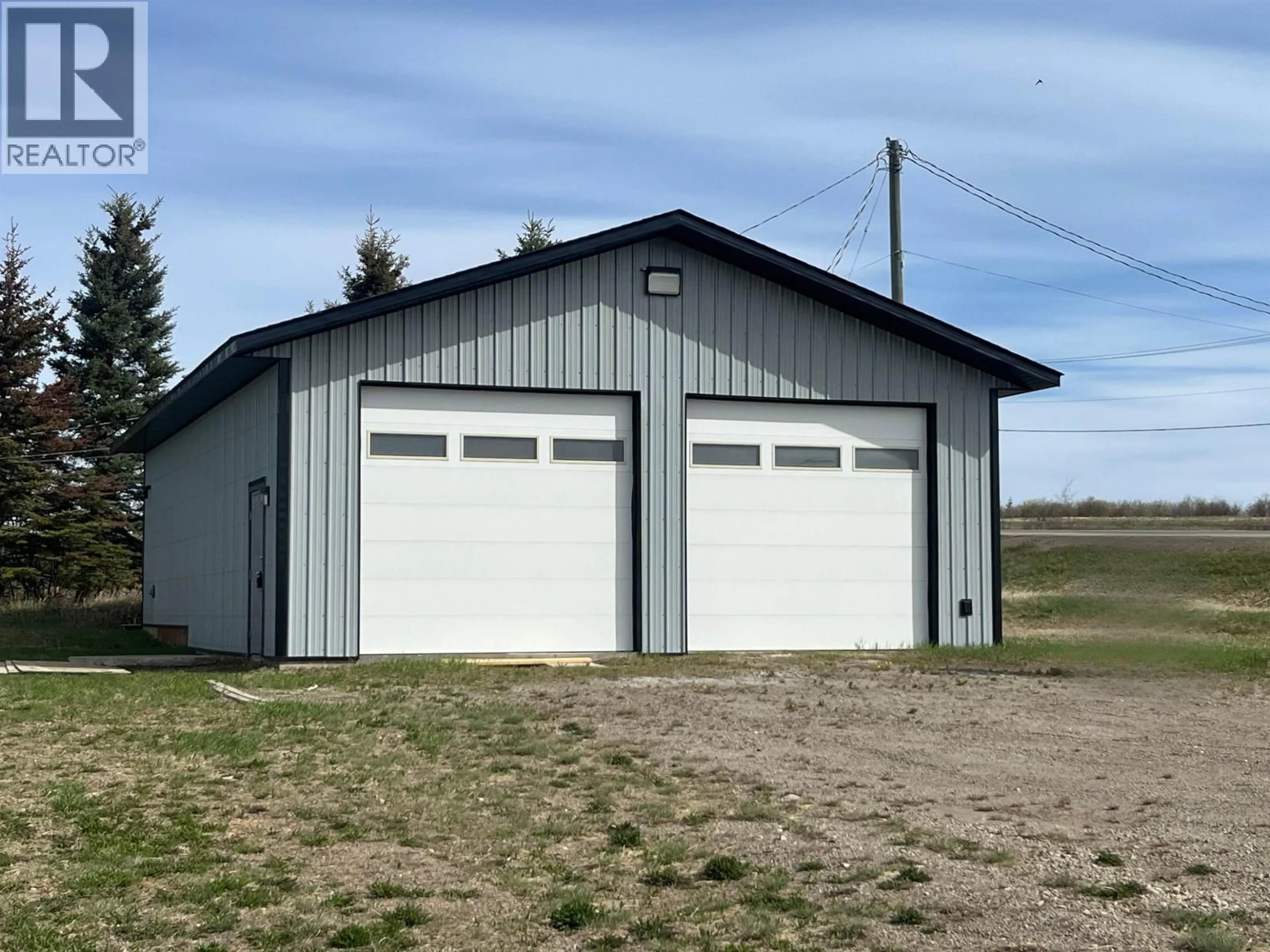 Indoor garage for 10720 NORTHERN LIGHTS DRIVE, Fort St. John British Columbia V1J0S8