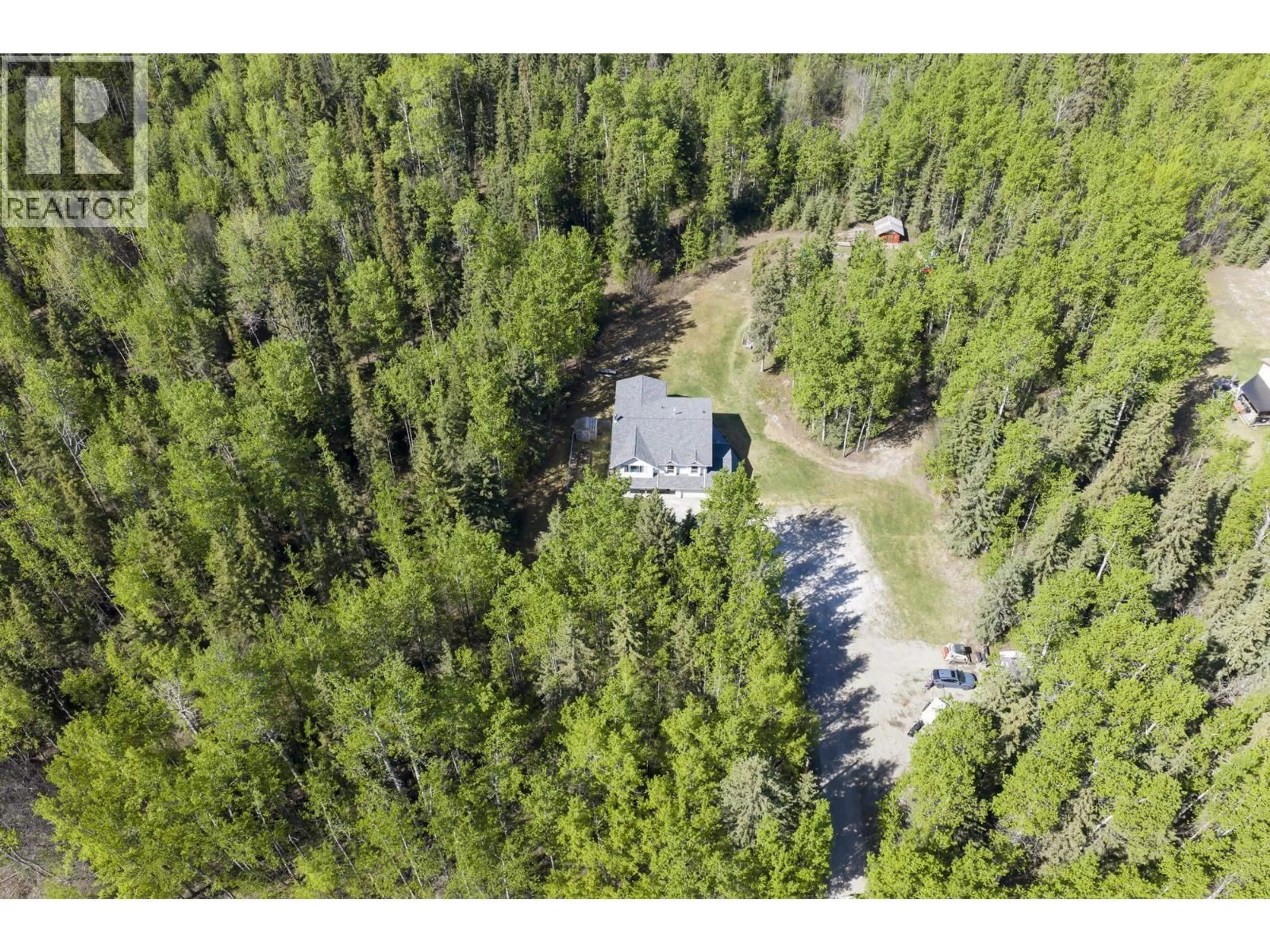 A pic from outside/outdoor area/front of a property/back of a property/a pic from drone, forest/trees view for 1275 ALDER AVENUE, Vanderhoof British Columbia V0J3A1