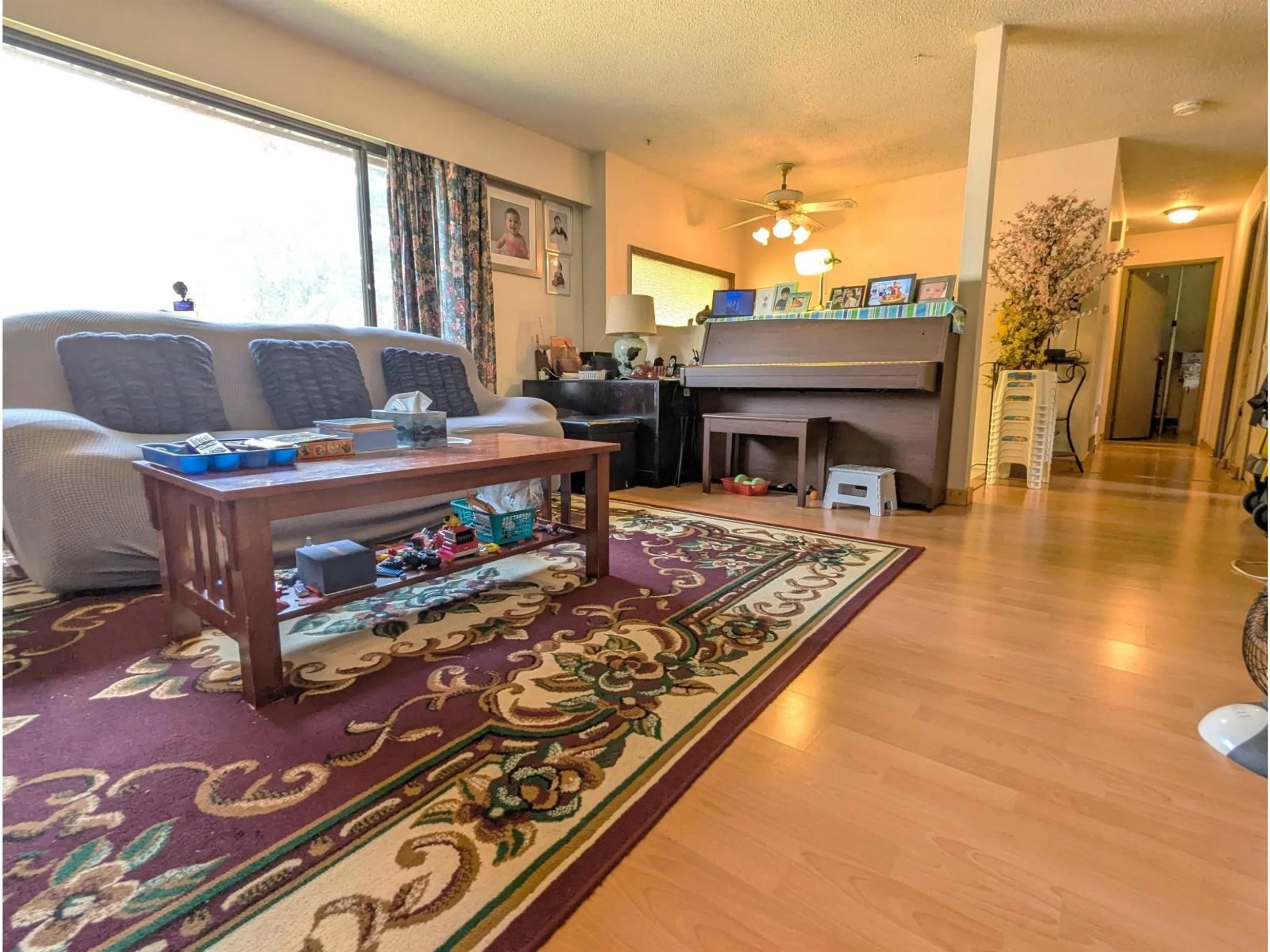 Living room with furniture, unknown for 12770 102 AVENUE, Surrey British Columbia V3V3E5