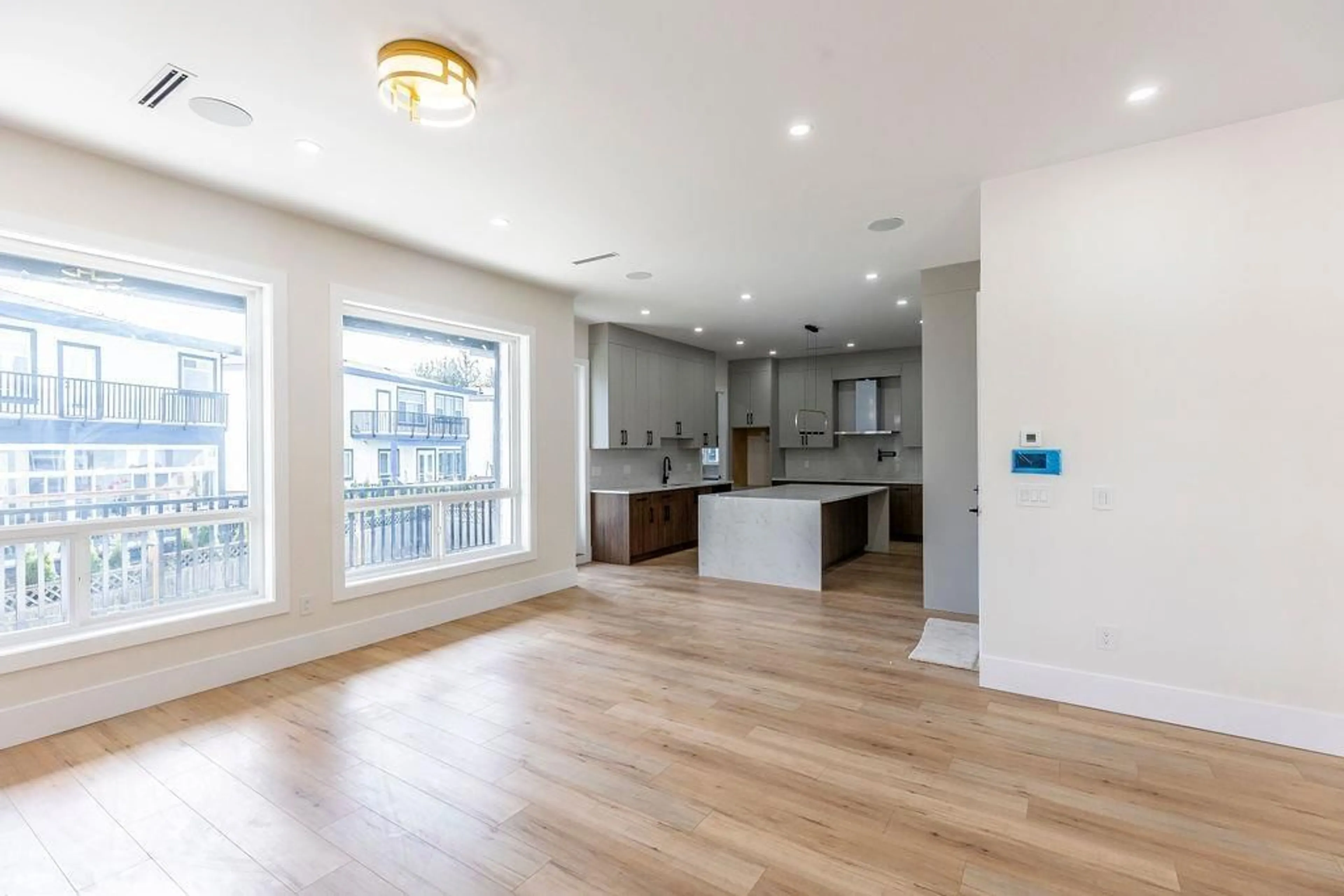 Open concept kitchen, wood/laminate floor for 7080 192A STREET, Surrey British Columbia V4N6V1