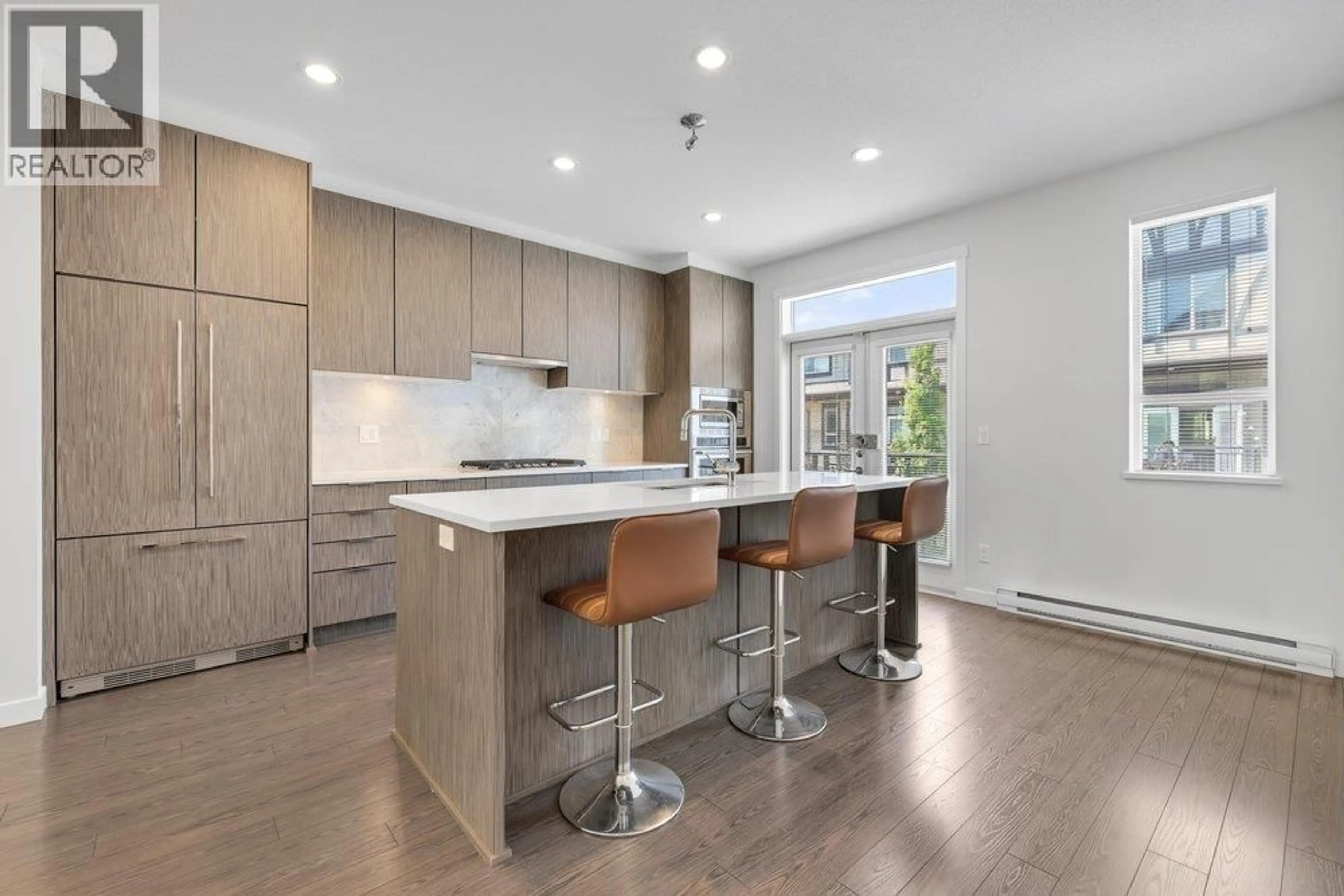 Open concept kitchen, wood/laminate floor for 47 - 10388 NO. 2 ROAD, Richmond British Columbia V7E0B9
