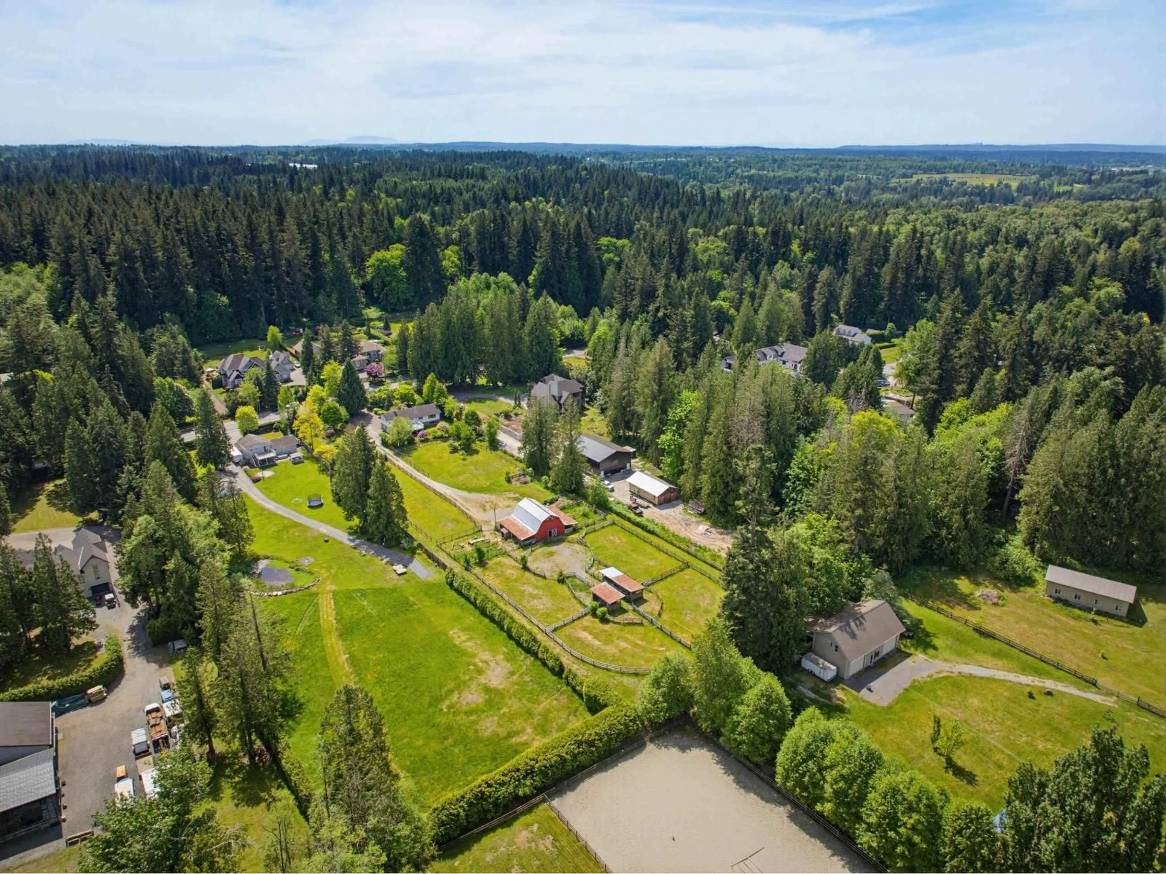 A pic from outside/outdoor area/front of a property/back of a property/a pic from drone, forest/trees view for 24105 61 AVENUE, Langley British Columbia V2Y1M5