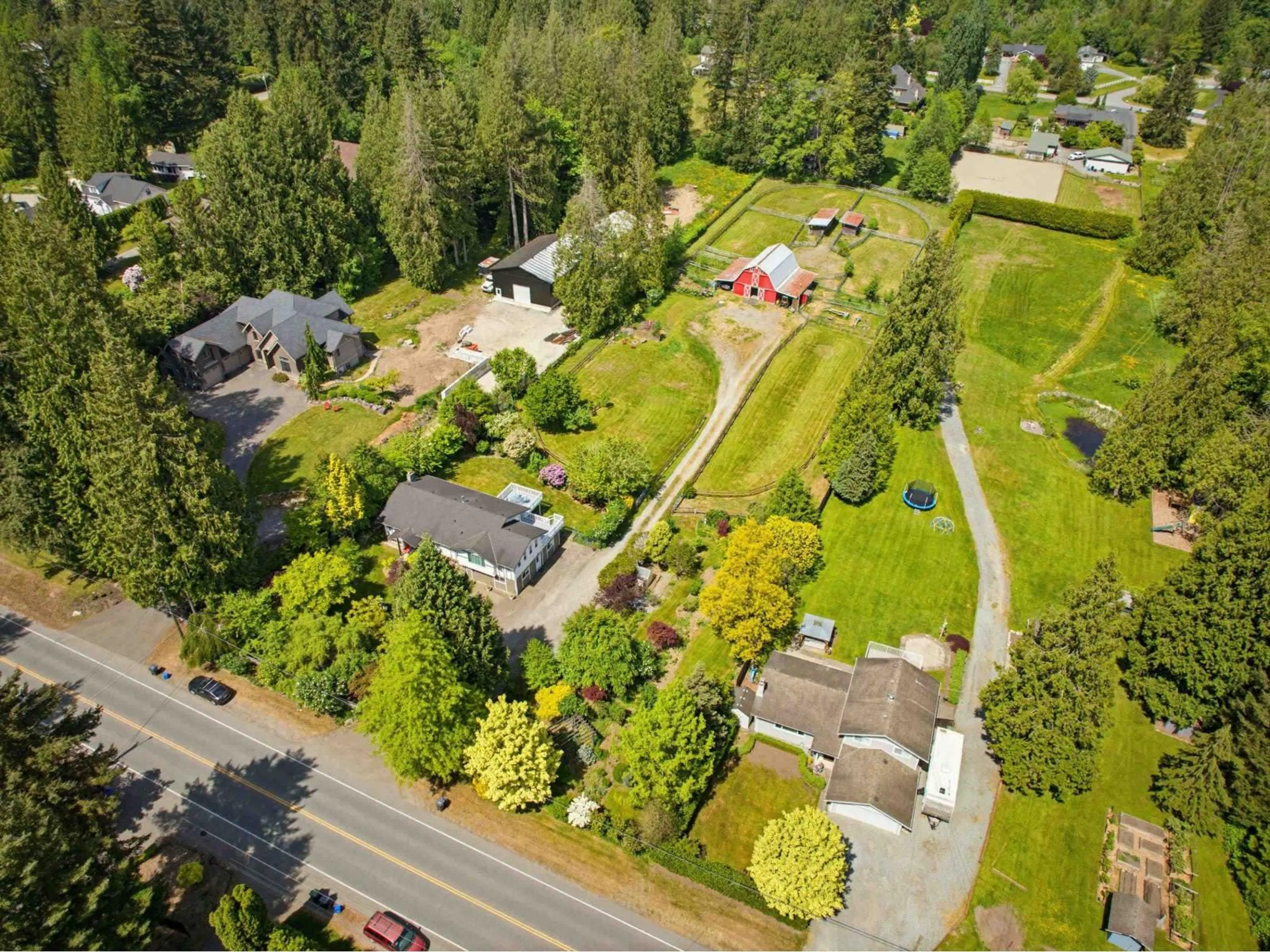 A pic from outside/outdoor area/front of a property/back of a property/a pic from drone, street for 24105 61 AVENUE, Langley British Columbia V2Y1M5