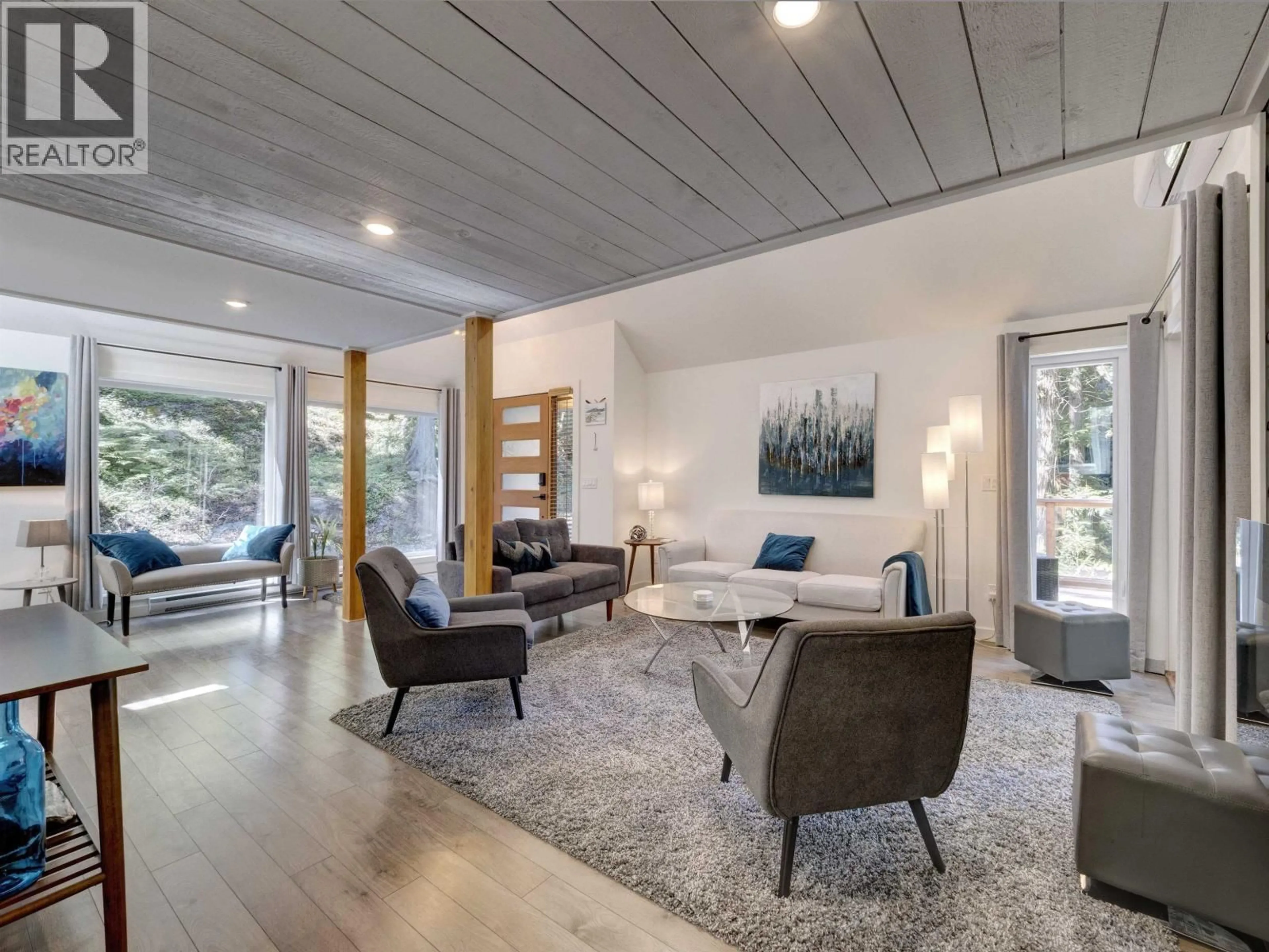 Living room with furniture, wood/laminate floor for 6165 CORACLE DRIVE, Sechelt British Columbia V7Z0C9