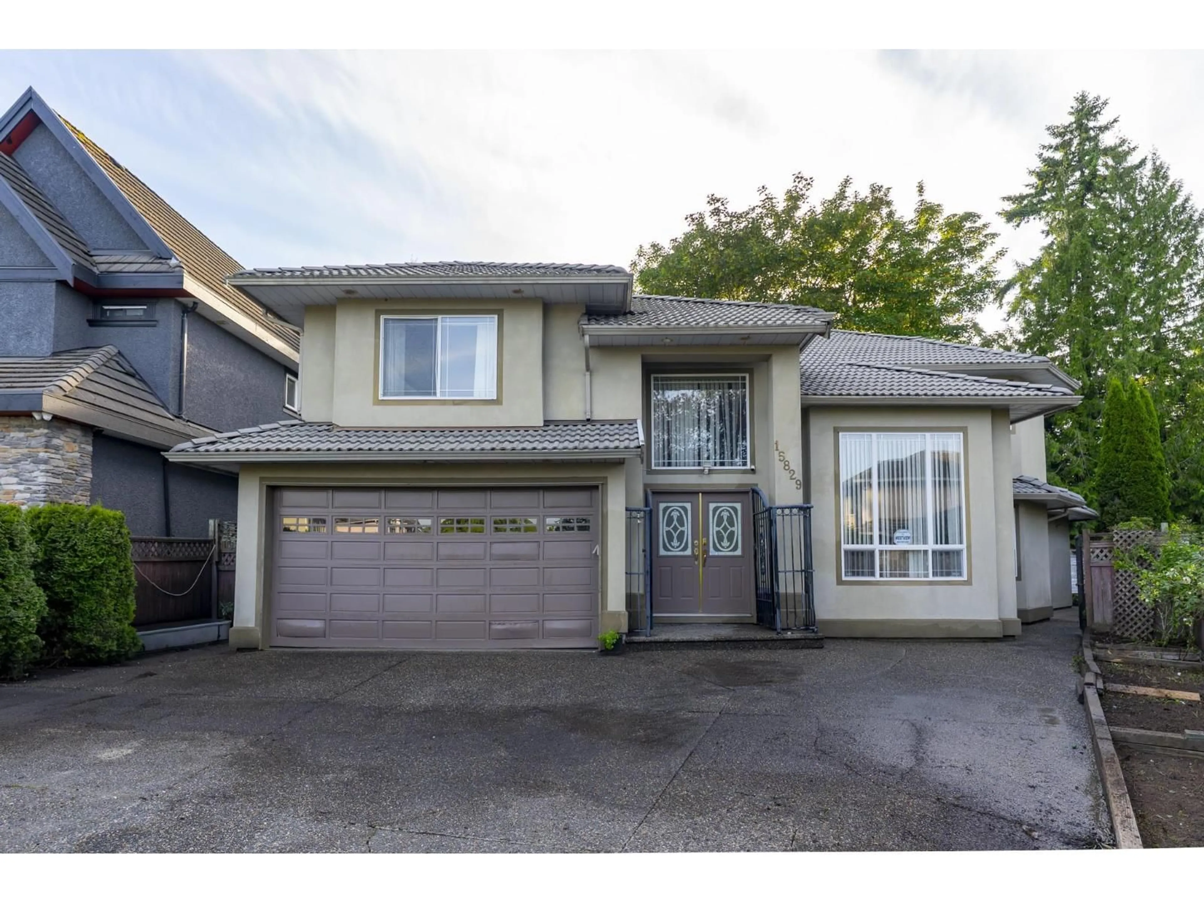 Home with vinyl exterior material, street for 15829 87A AVENUE, Surrey British Columbia V4N4Z5