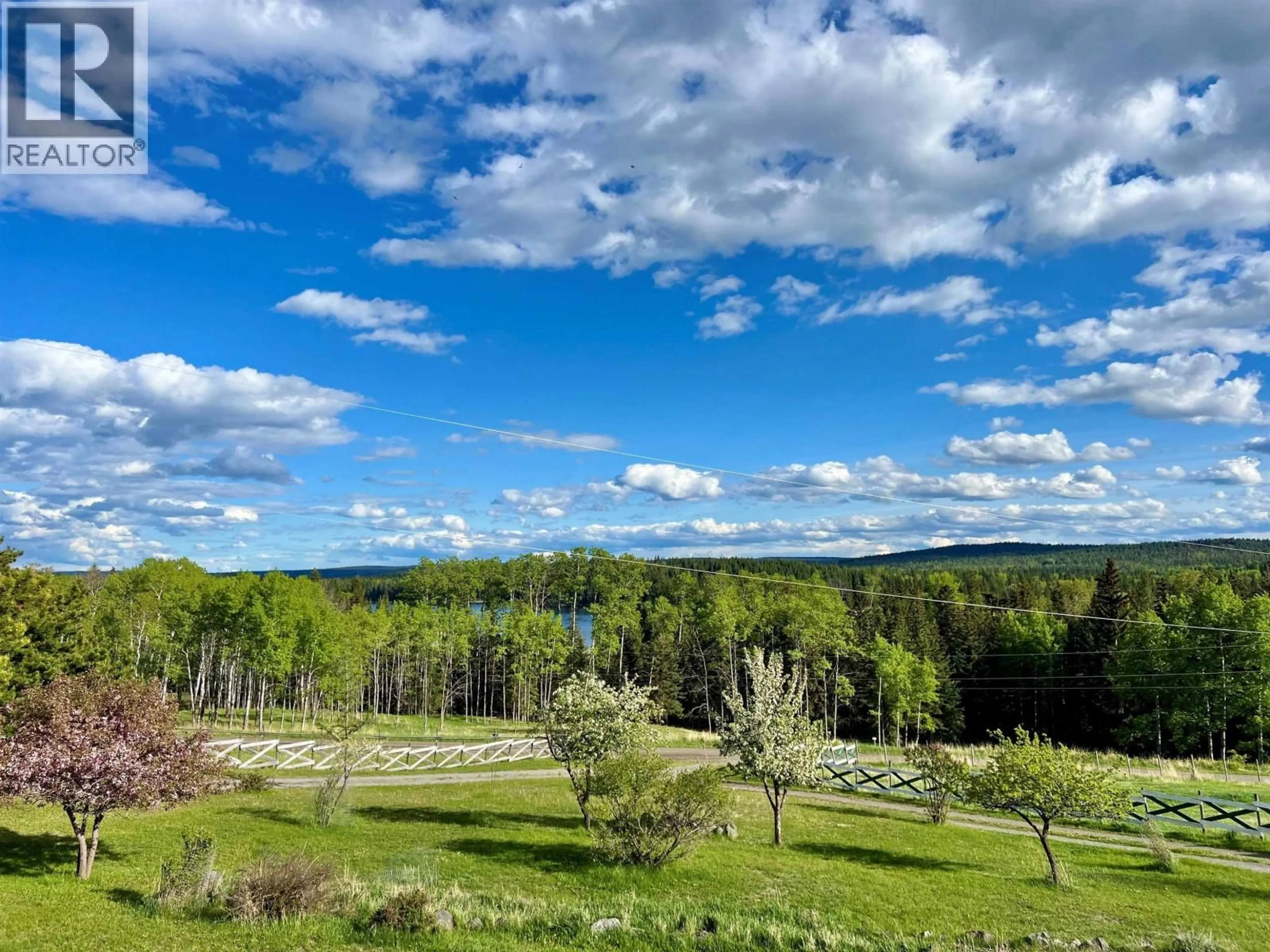 A pic from outside/outdoor area/front of a property/back of a property/a pic from drone, forest/trees view for 5785 SIMON LAKE ROAD, 100 Mile House British Columbia V0K2E1