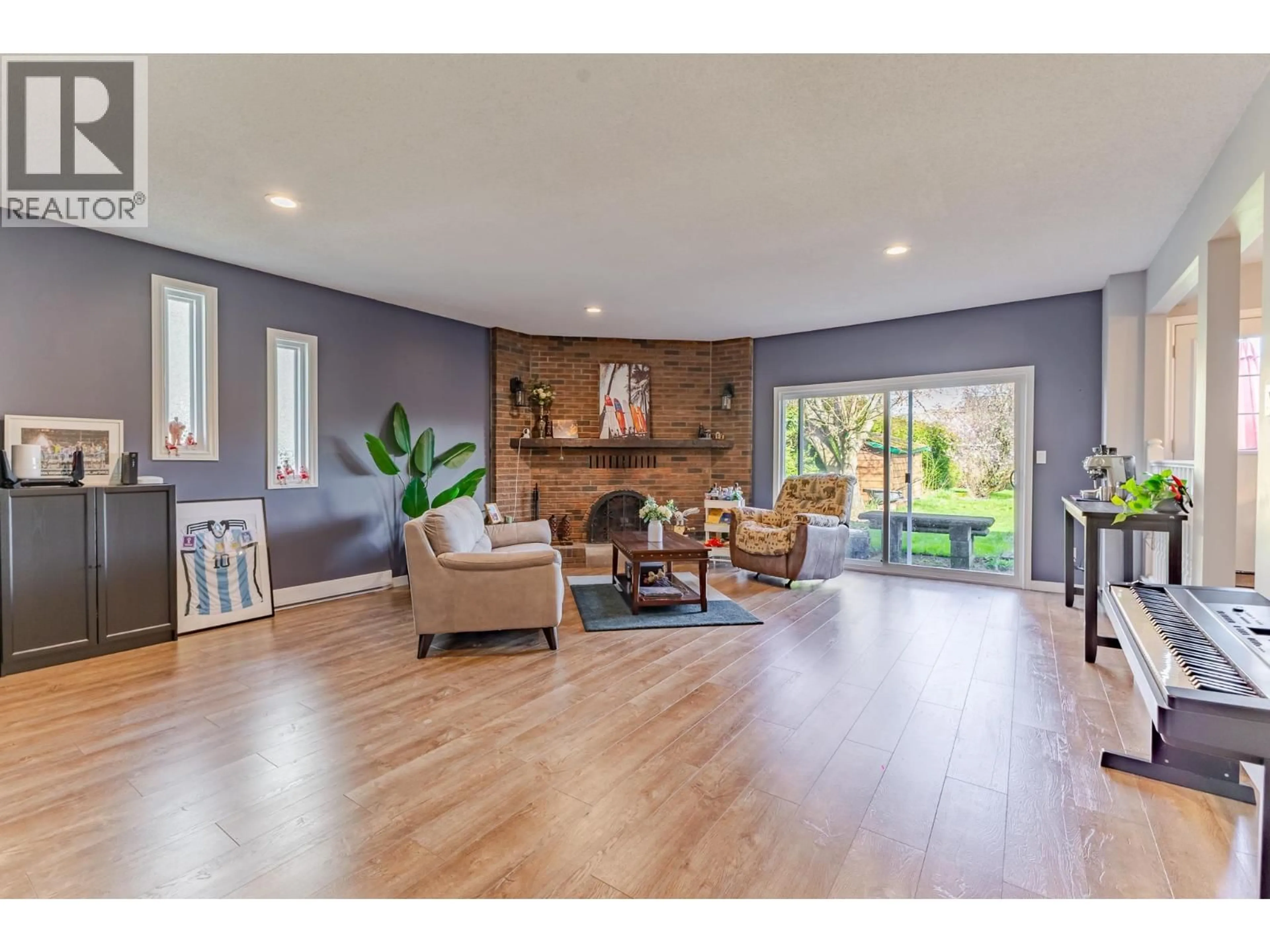 Living room with furniture, wood/laminate floor for 6341 43A AVENUE, Delta British Columbia V4K1B3