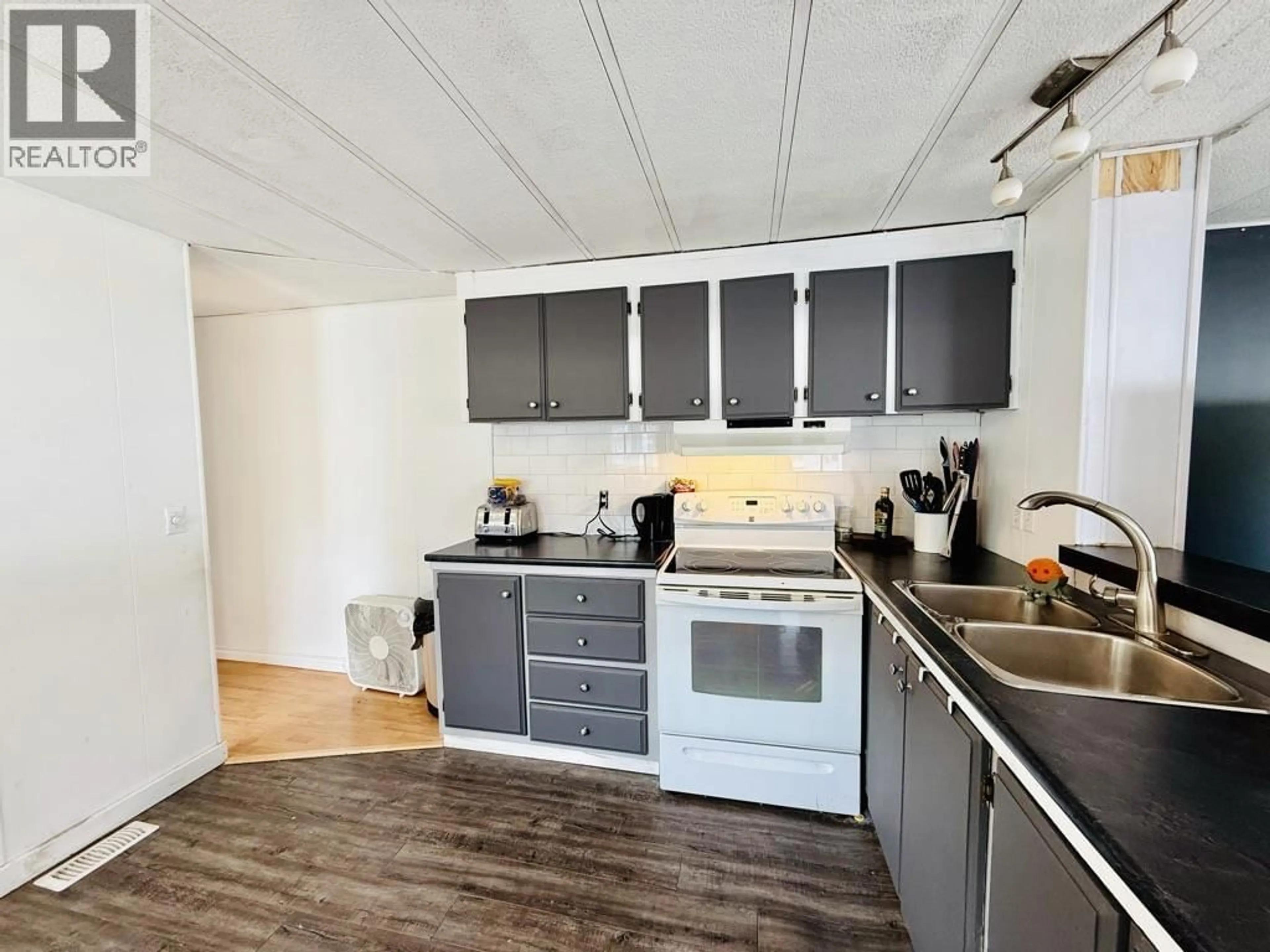Standard kitchen, wood/laminate floor for 69 - 95 LAIDLAW ROAD, Smithers British Columbia V0J2N6