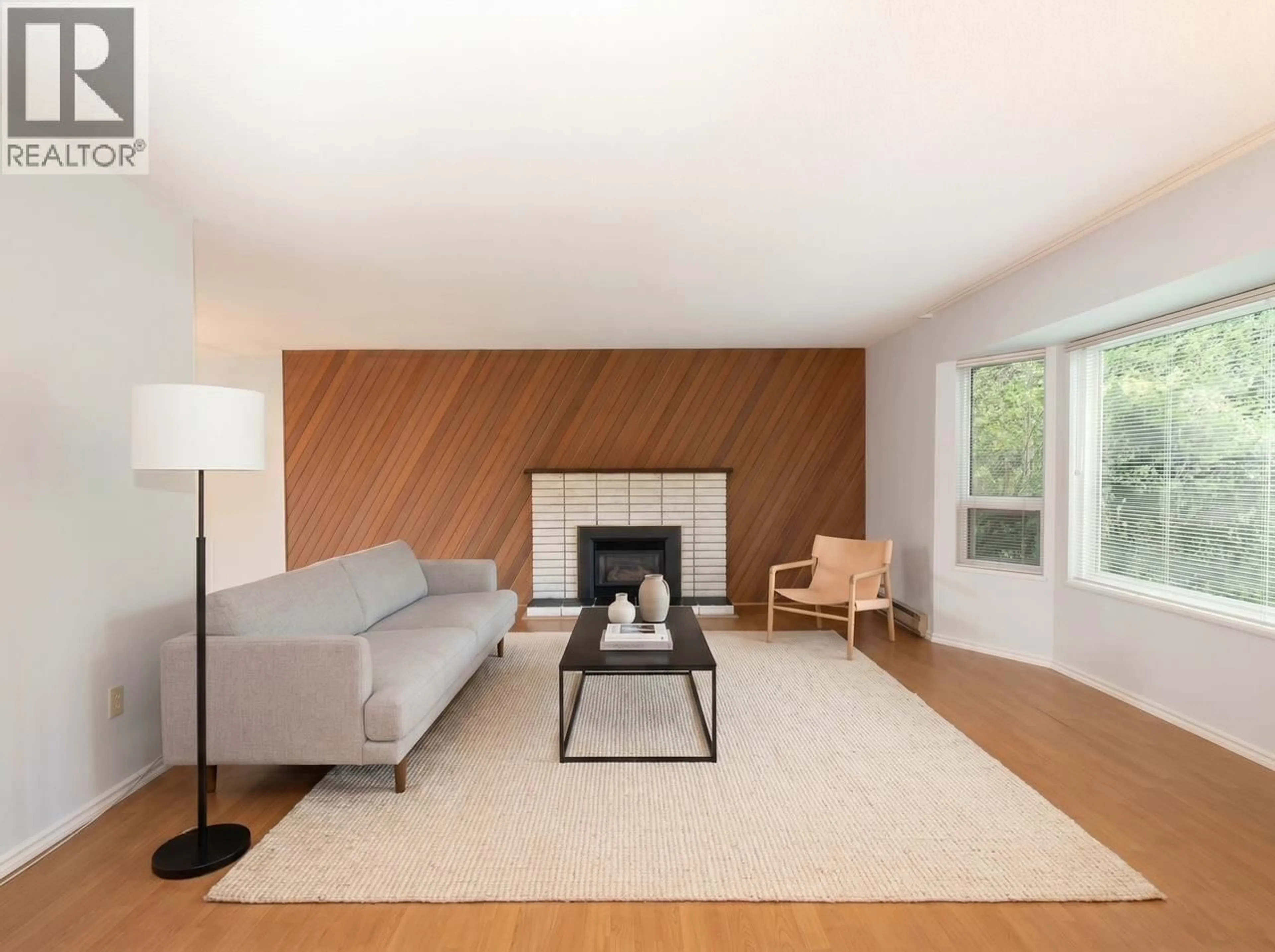 Living room with furniture, wood/laminate floor for 1285 LUCKING PLACE, North Vancouver British Columbia V7J3L5