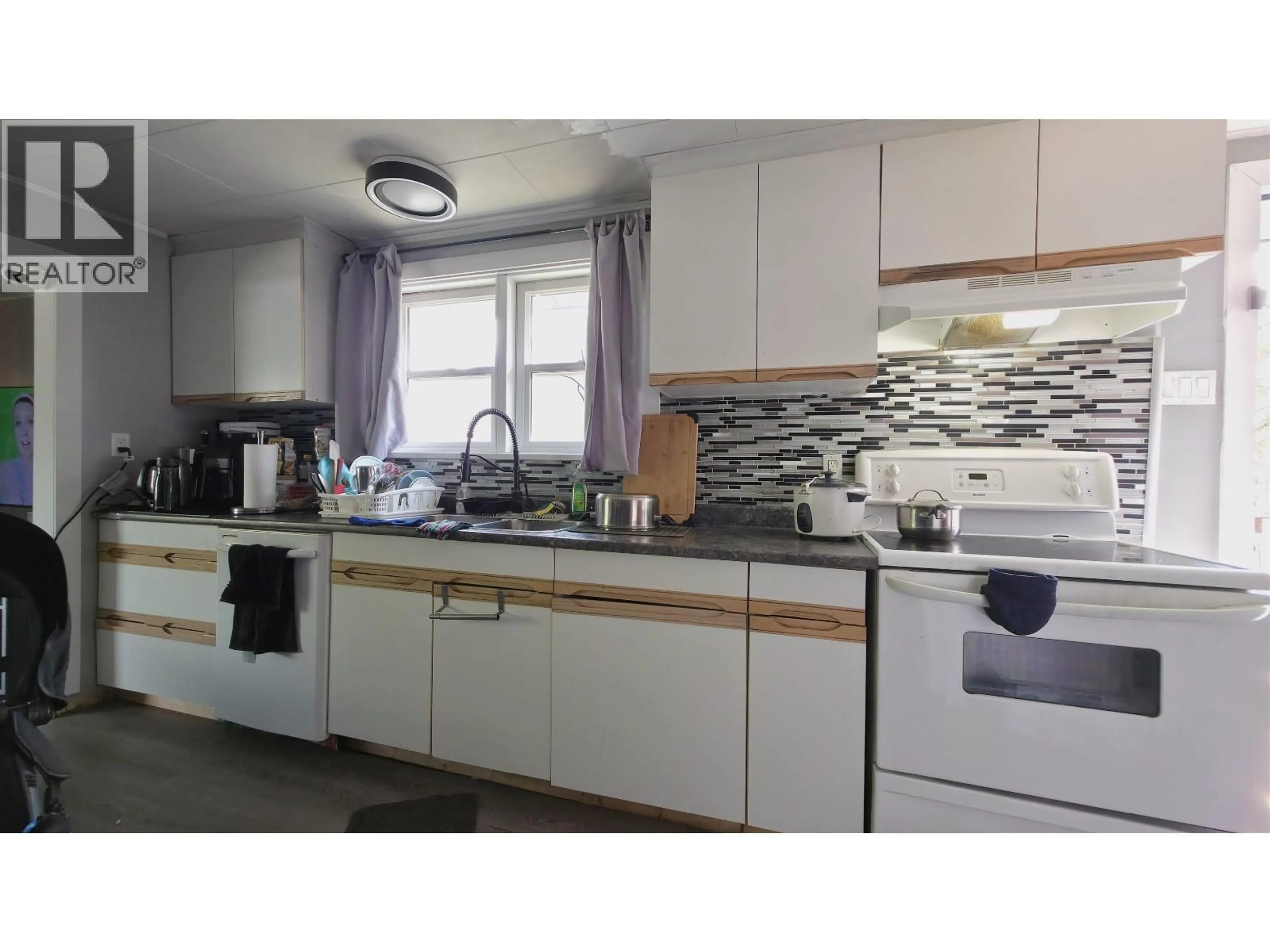 Standard kitchen, wood/laminate floor for 1047 CARNEY STREET, Prince George British Columbia V2M2L1