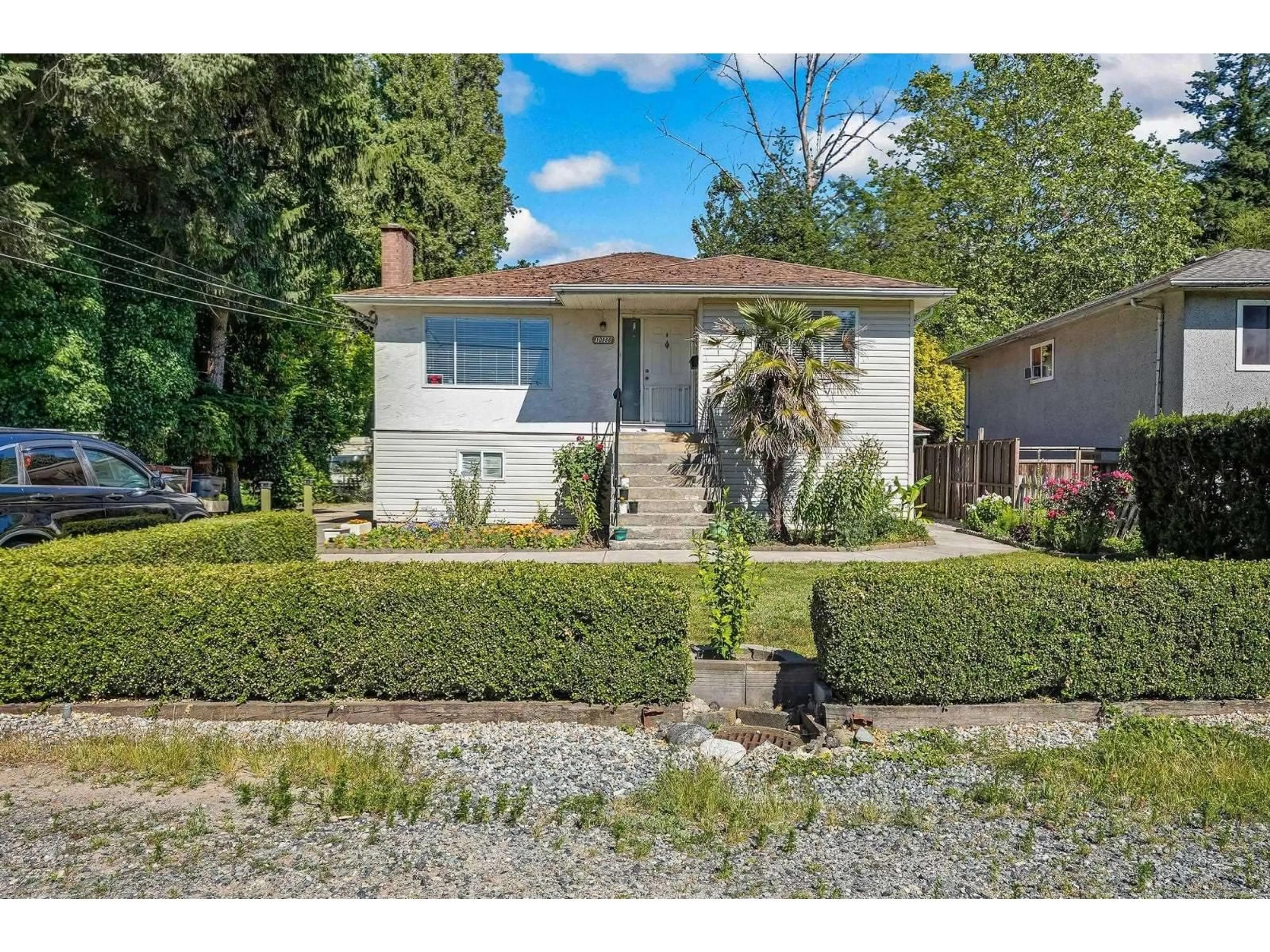 A pic from outside/outdoor area/front of a property/back of a property/a pic from drone, street for 10886 132A STREET, Surrey British Columbia V3T3Y4