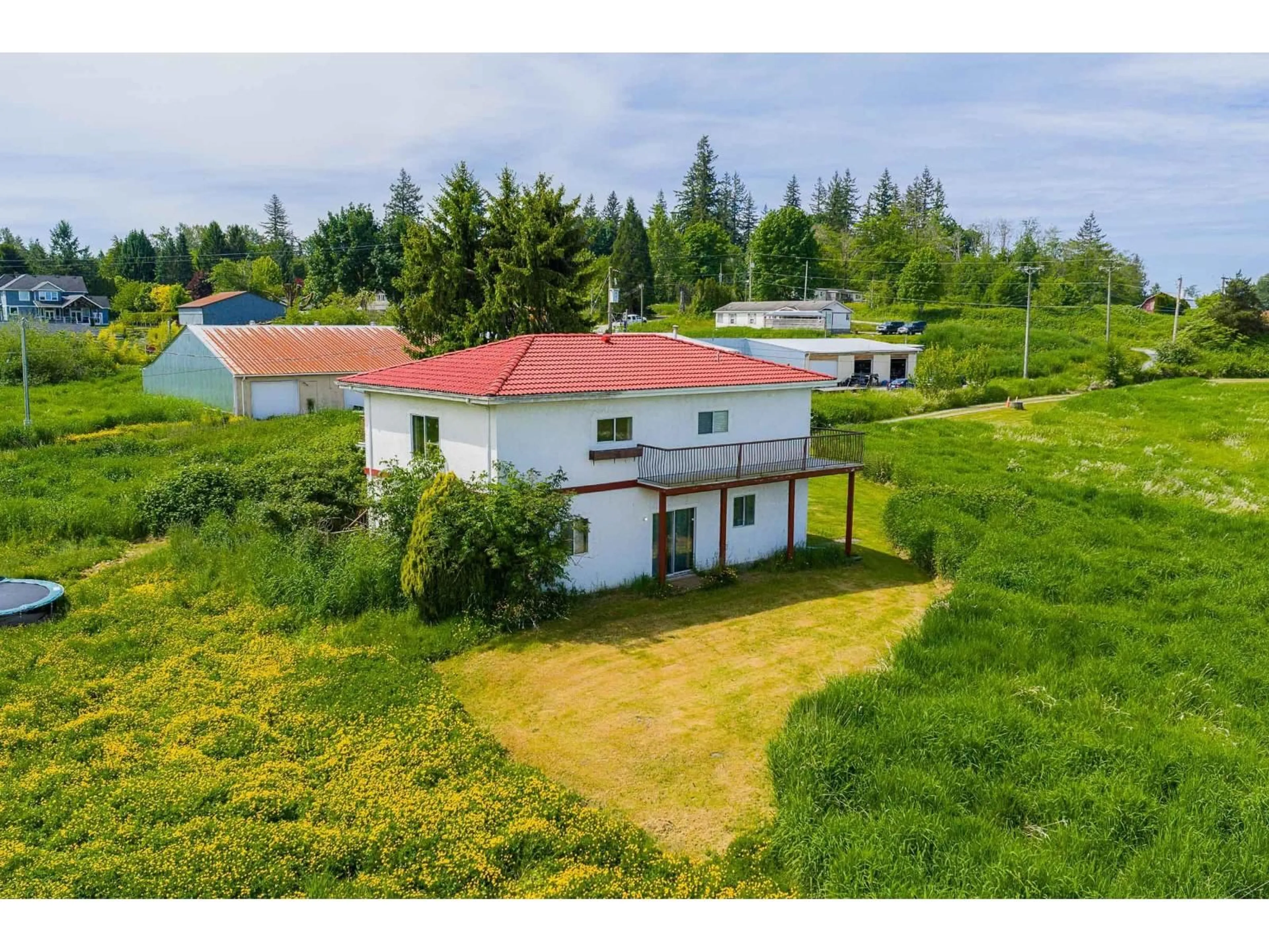 A pic from outside/outdoor area/front of a property/back of a property/a pic from drone, building for 1550 227 STREET, Langley British Columbia V2Z1K6
