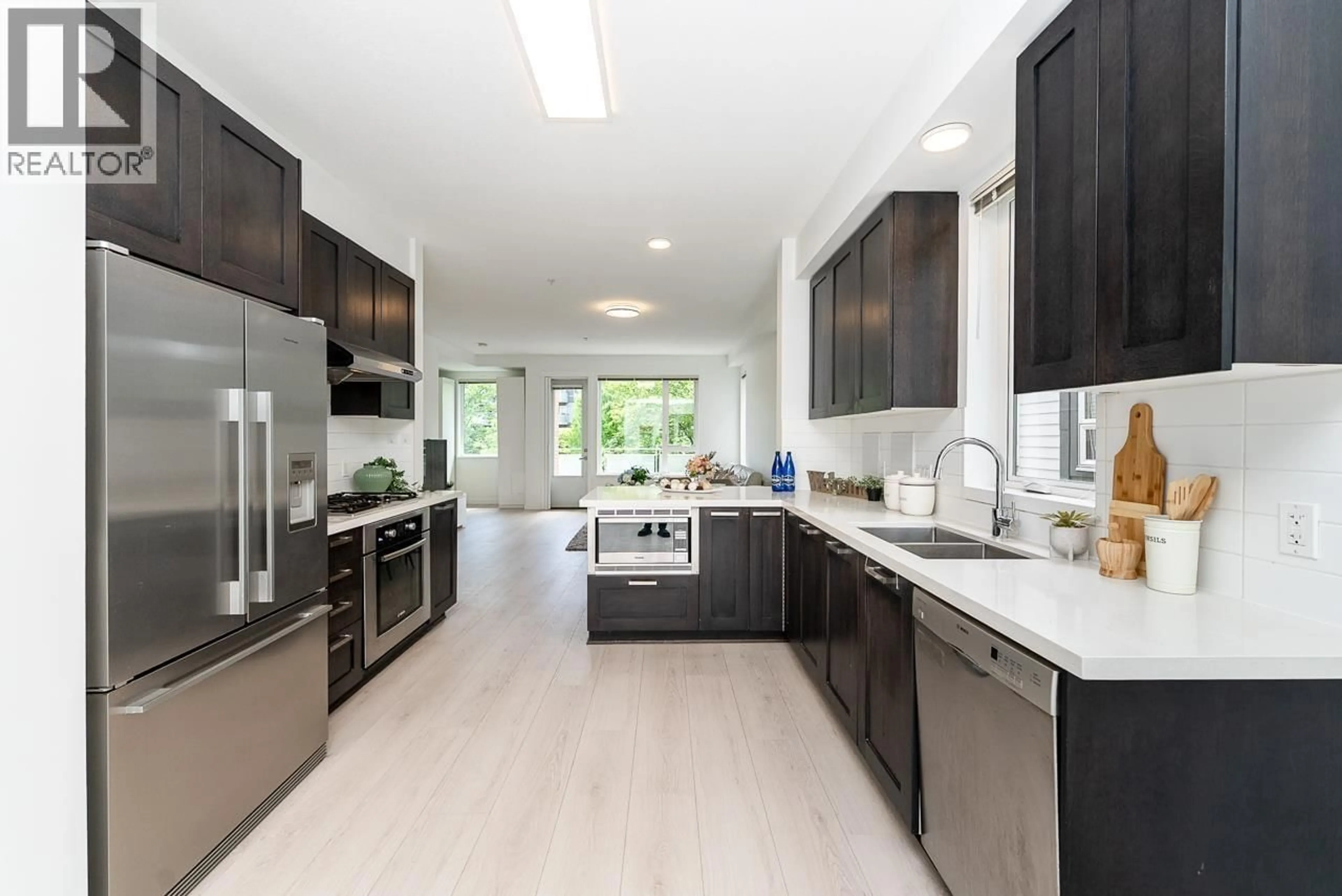 Open concept kitchen, ceramic/tile floor for 3187 E KENT AVENUE NORTH, Vancouver British Columbia V5S4Y1