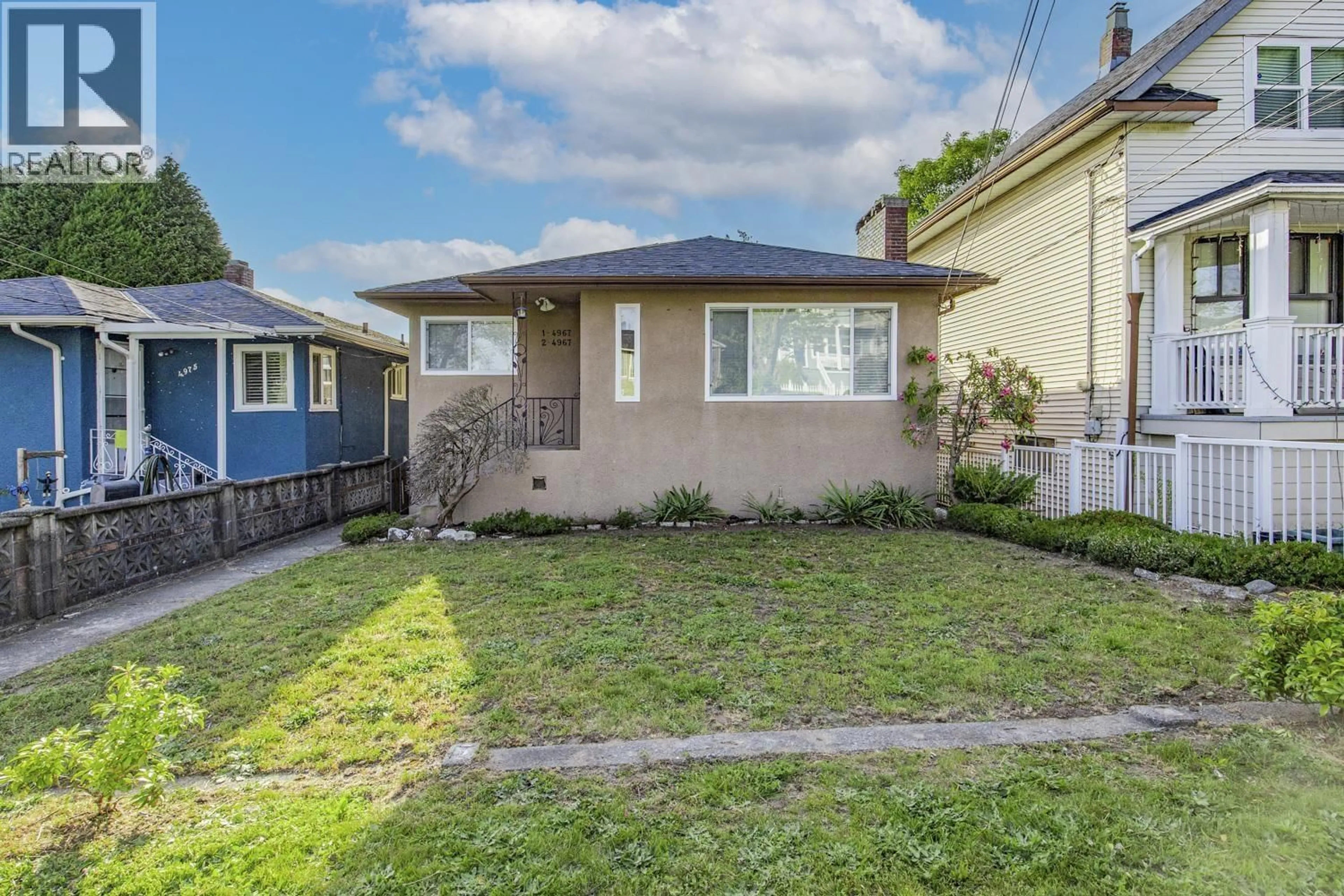 A pic from outside/outdoor area/front of a property/back of a property/a pic from drone, street for 1 - 4967 SPENCER STREET, Vancouver British Columbia V5R3Z9