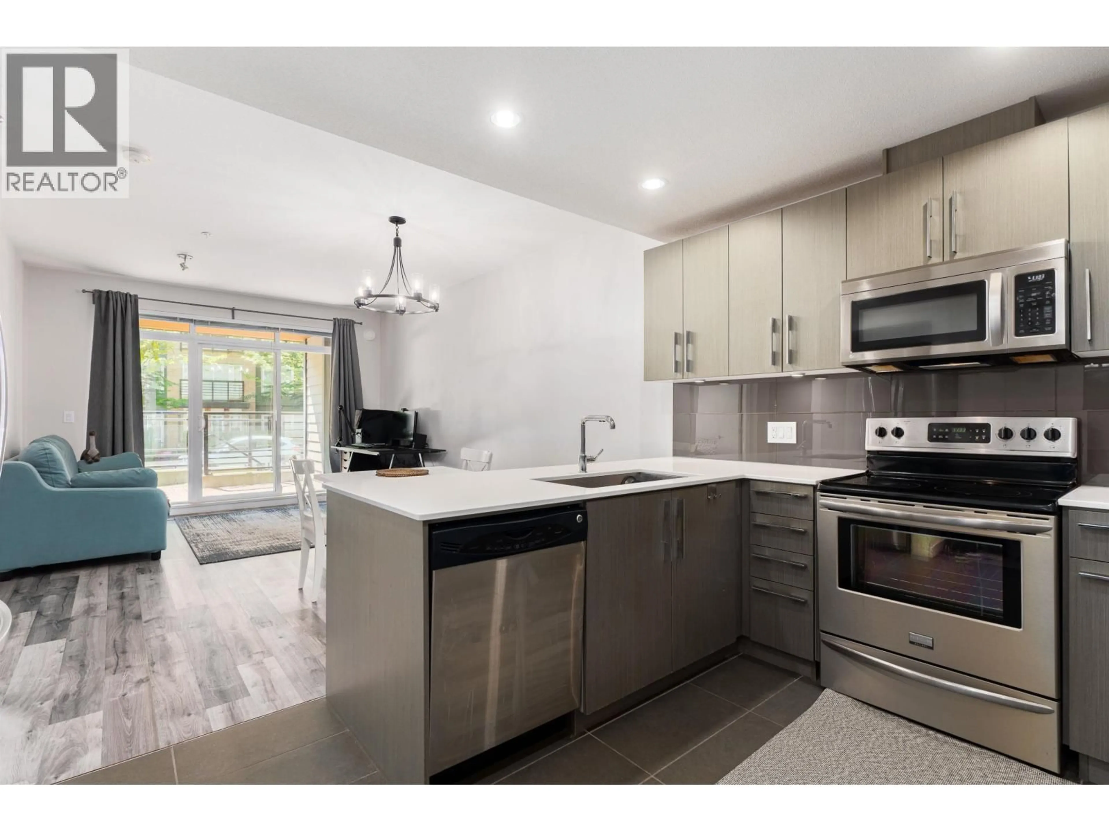 Open concept kitchen, ceramic/tile floor for 112 - 3479 WESBROOK MALL, Vancouver British Columbia V6S0B7