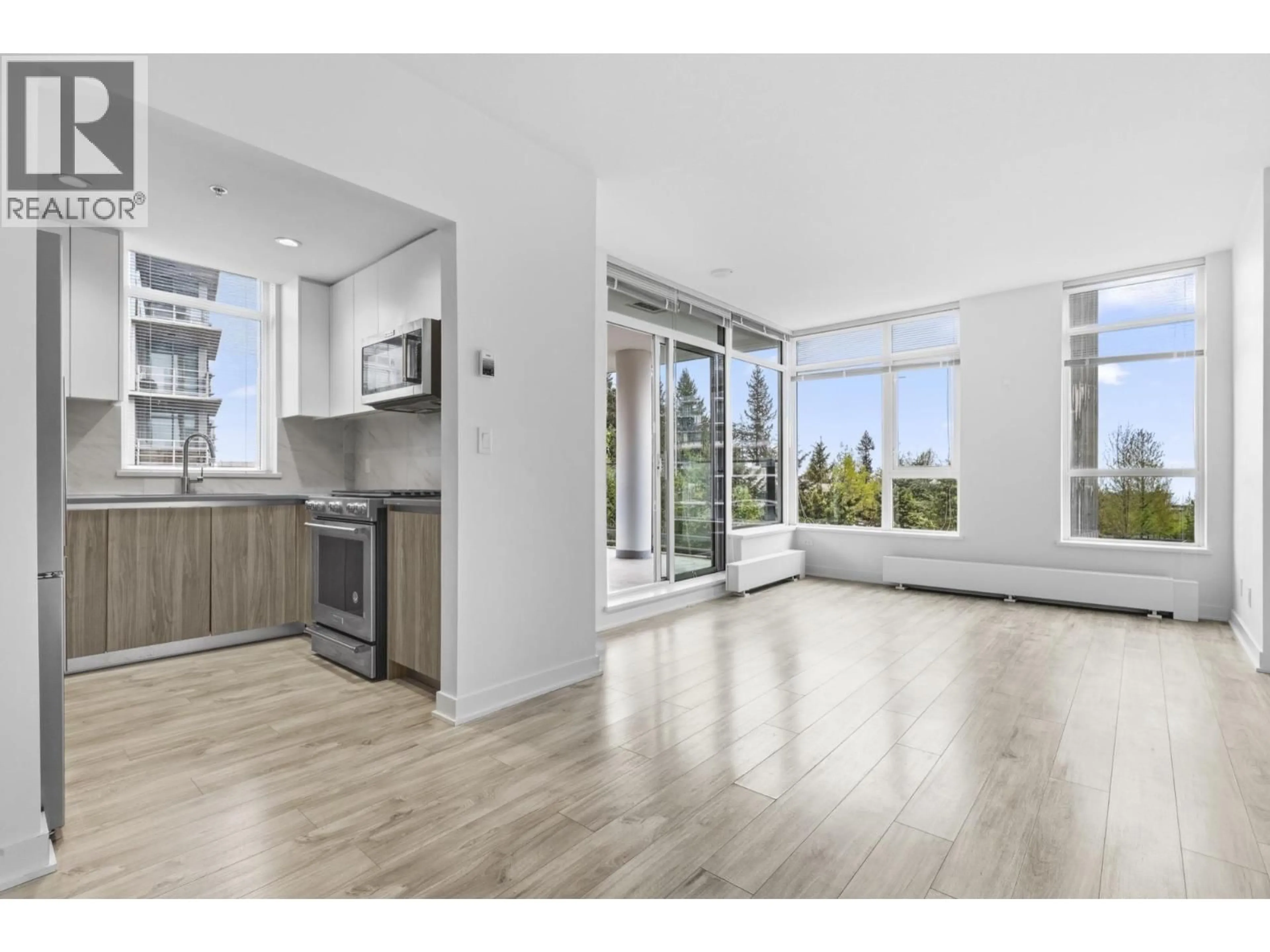 Open concept kitchen, unknown for 702 - 8940 UNIVERSITY CRESCENT, Burnaby British Columbia V5A0E7