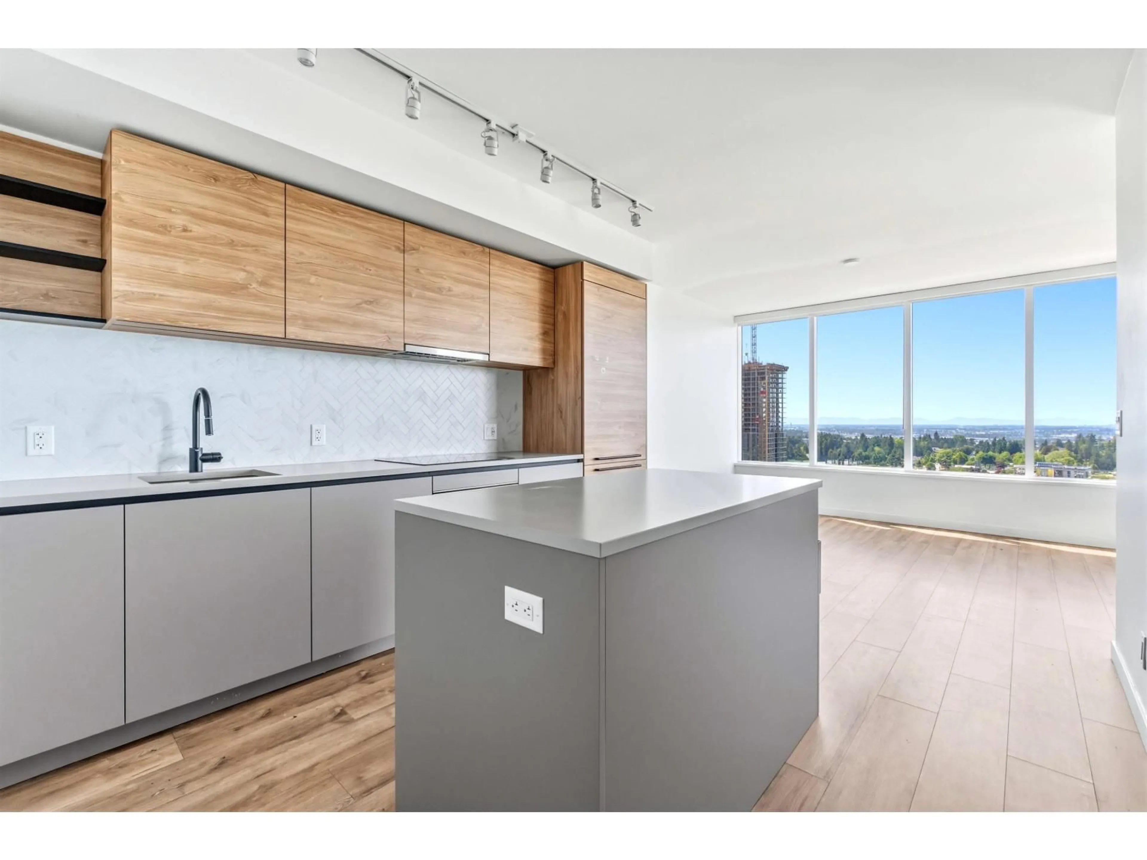 Open concept kitchen, wood/laminate floor for 2501 - 10448 UNIVERSITY DRIVE, Surrey British Columbia V3T0S7