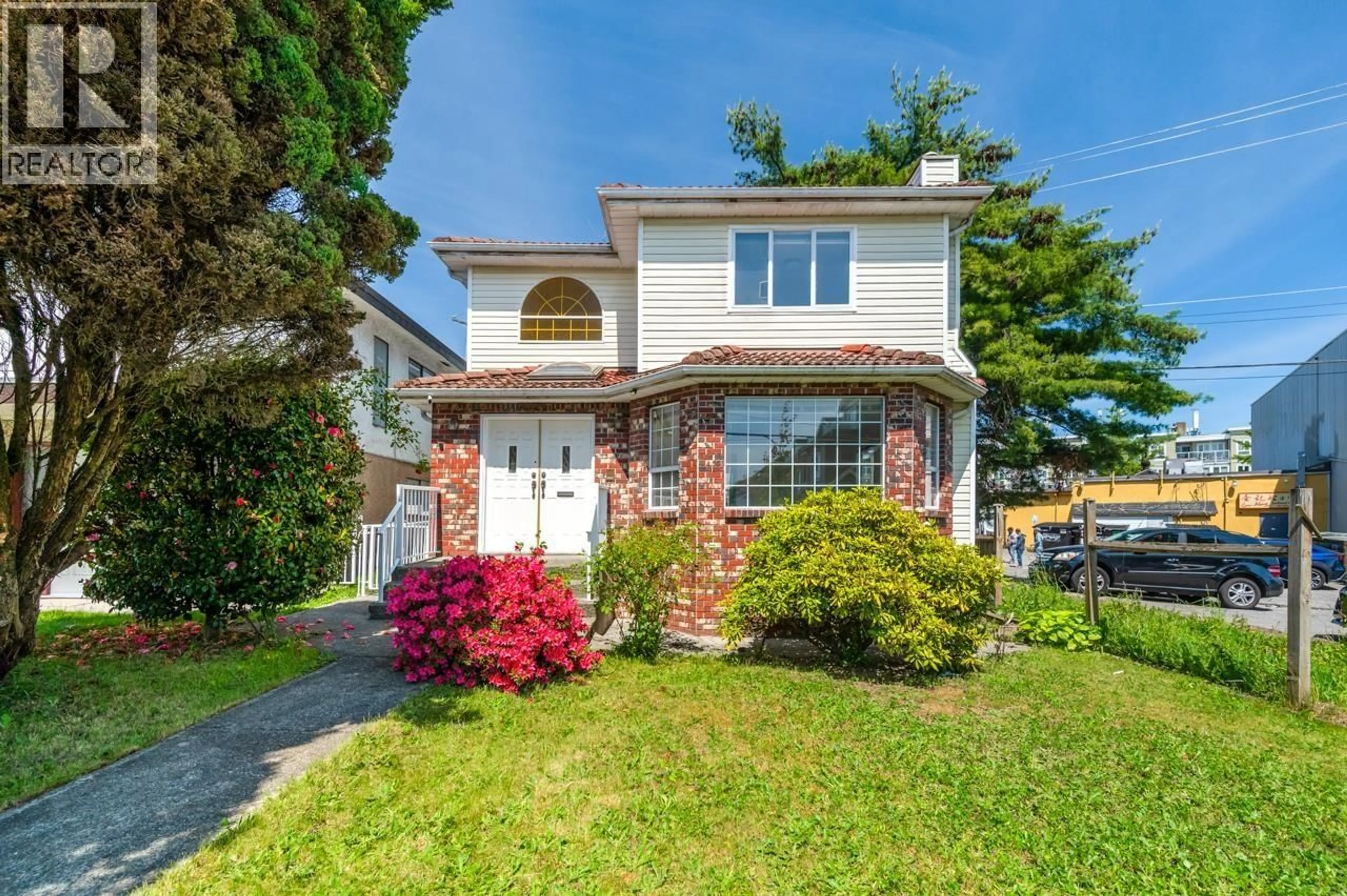 Home with vinyl exterior material, street for 2547 34TH AVENUE, Vancouver British Columbia V5R2T1