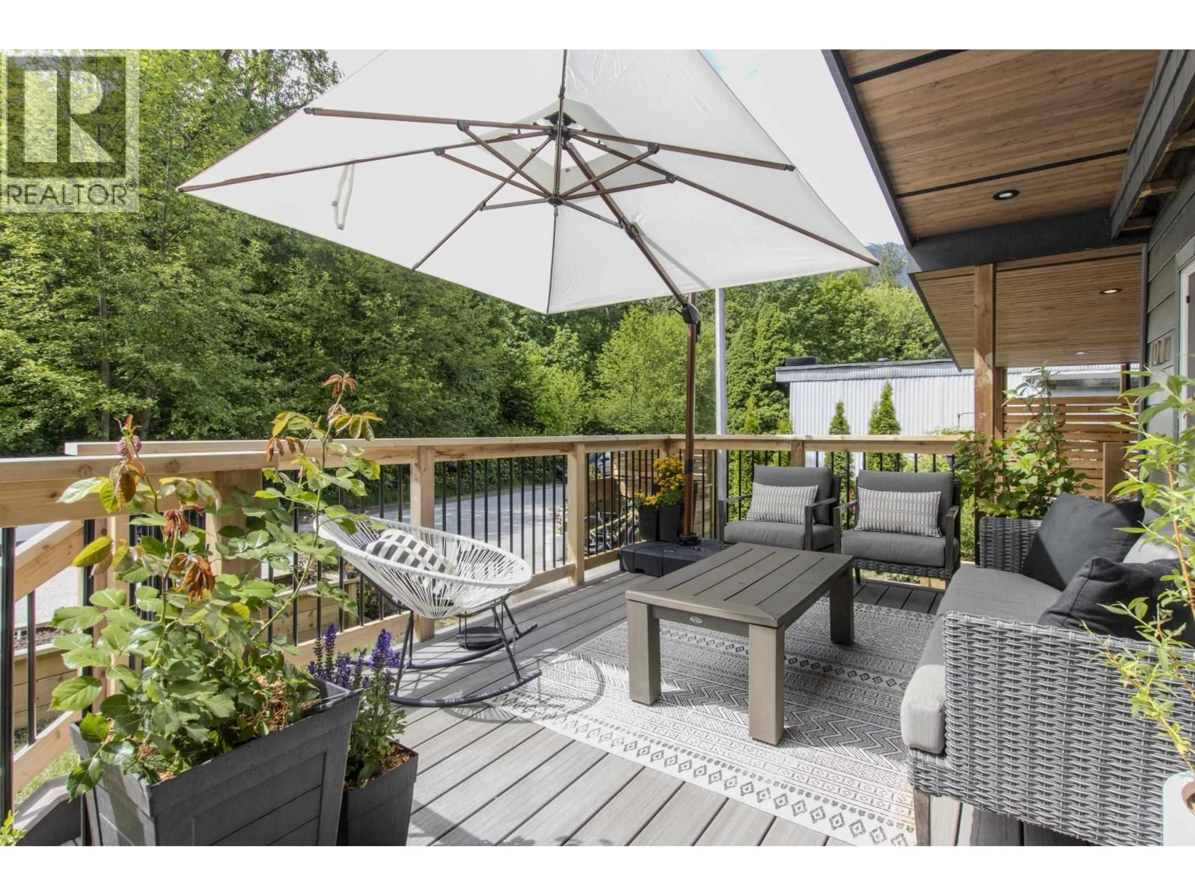 Patio, water/lake/river/ocean view for 101 - 40157 GOVERNMENT ROAD, Squamish British Columbia V8B0B3