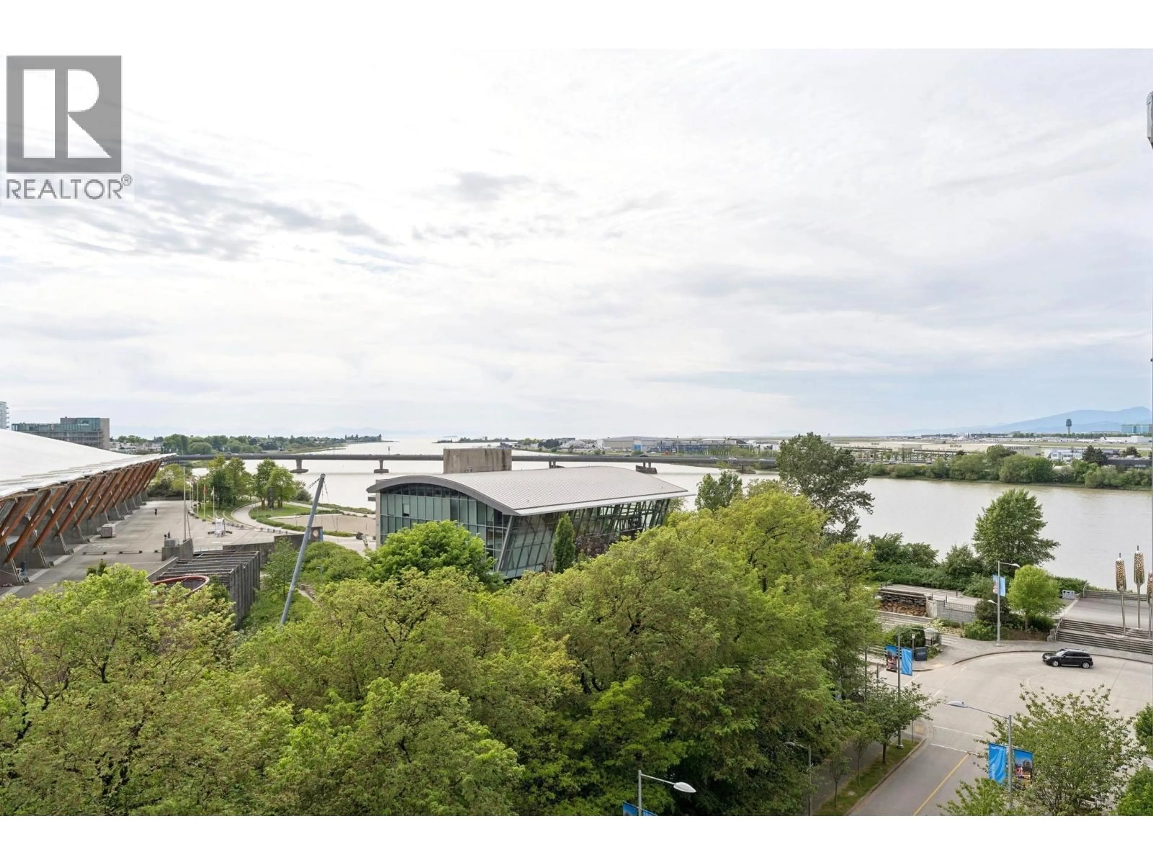 A pic from outside/outdoor area/front of a property/back of a property/a pic from drone, water/lake/river/ocean view for 704 - 6611 PEARSON WAY, Richmond British Columbia V7C0C3