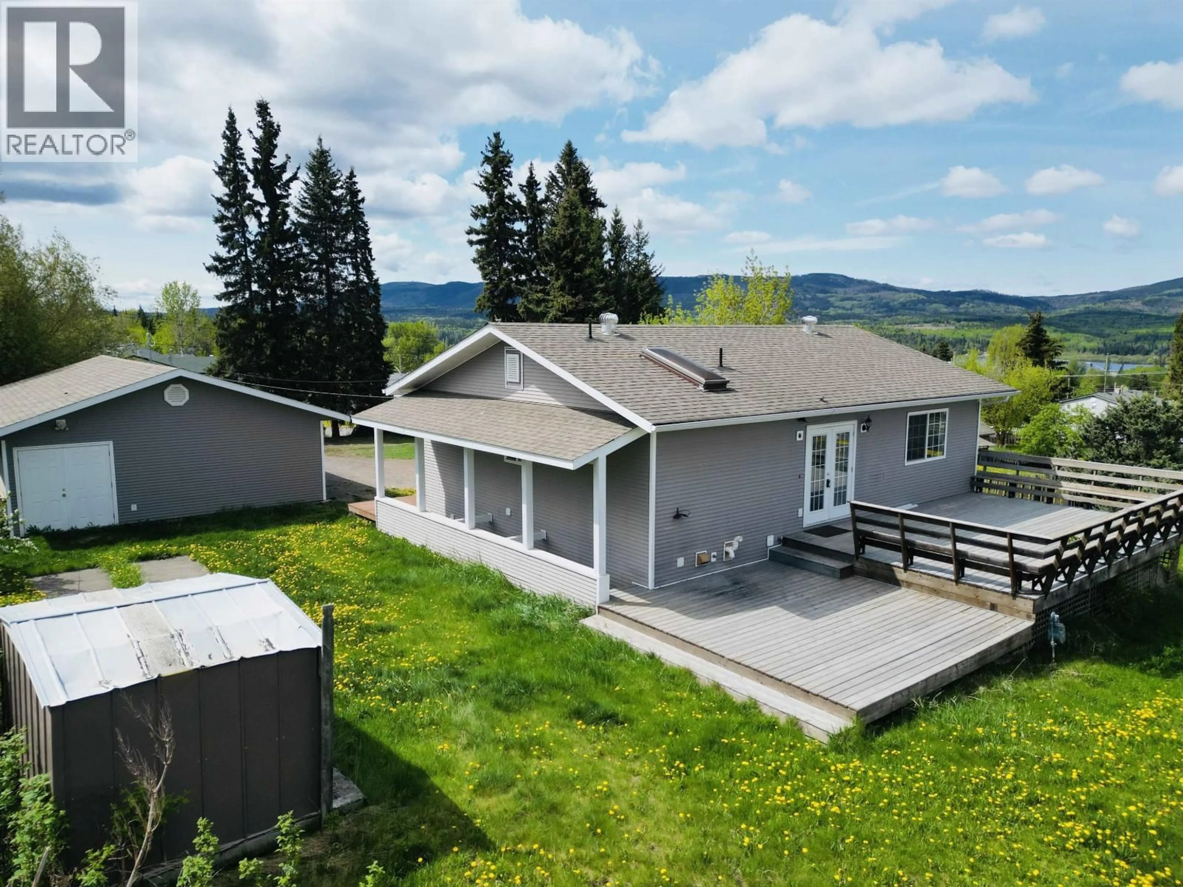 A pic from outside/outdoor area/front of a property/back of a property/a pic from drone, mountain view for 245 8TH AVENUE, Burns Lake British Columbia V0J1E0