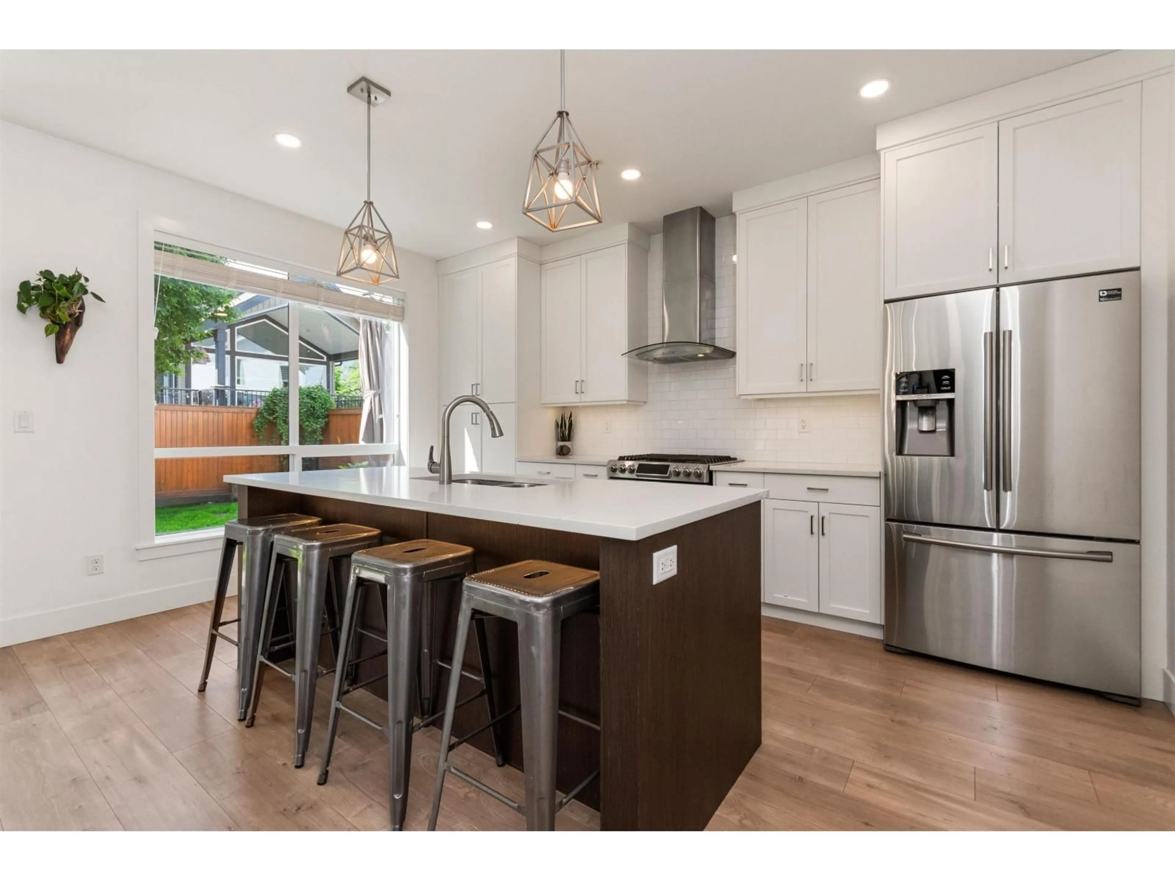 Open concept kitchen, wood/laminate floor for 44410 FRESHWATER DRIVE, Chilliwack British Columbia V2R6A3