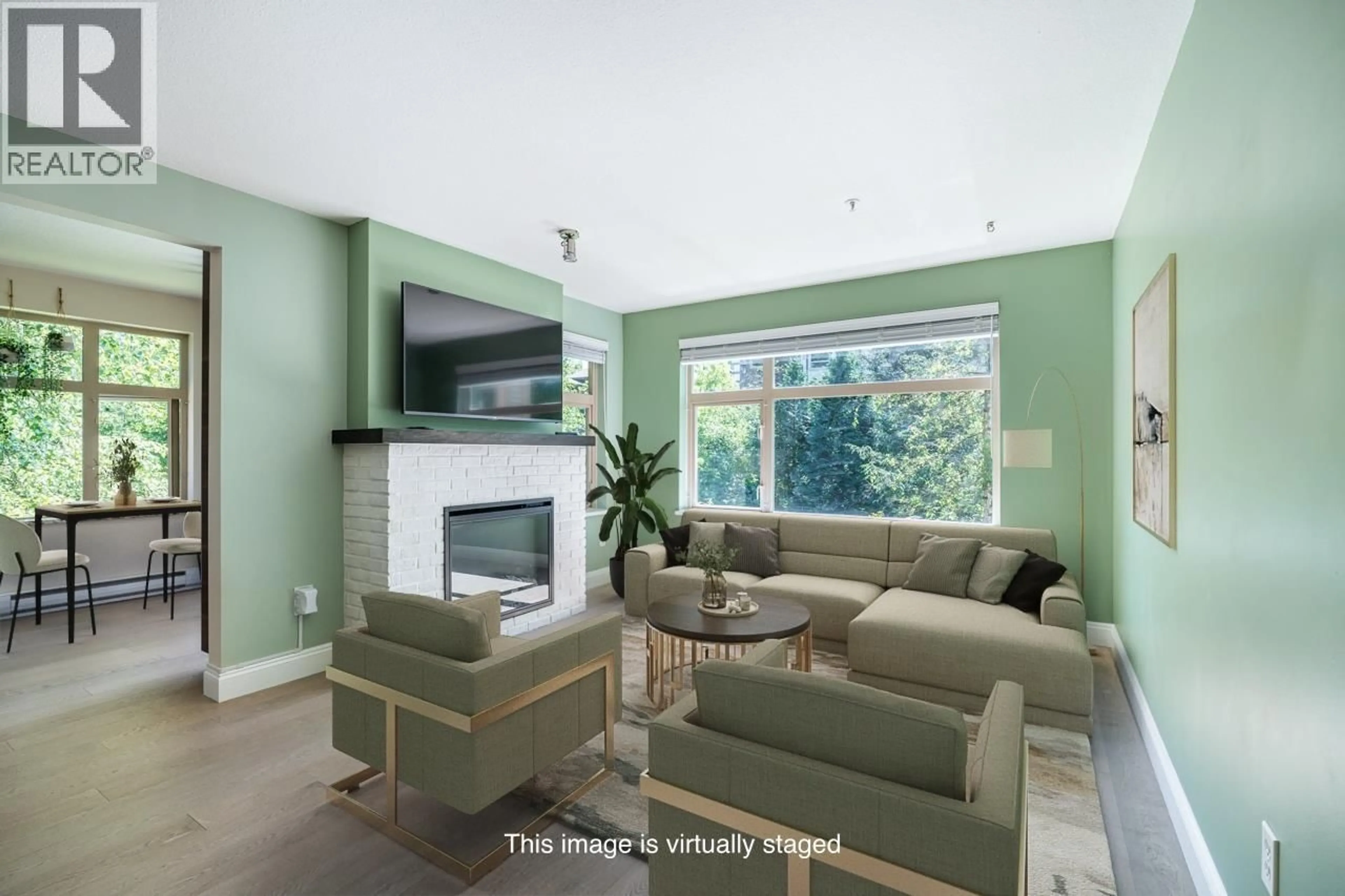 Living room with furniture, unknown for 203 - 400 KLAHANIE DRIVE, Port Moody British Columbia V3H5K9