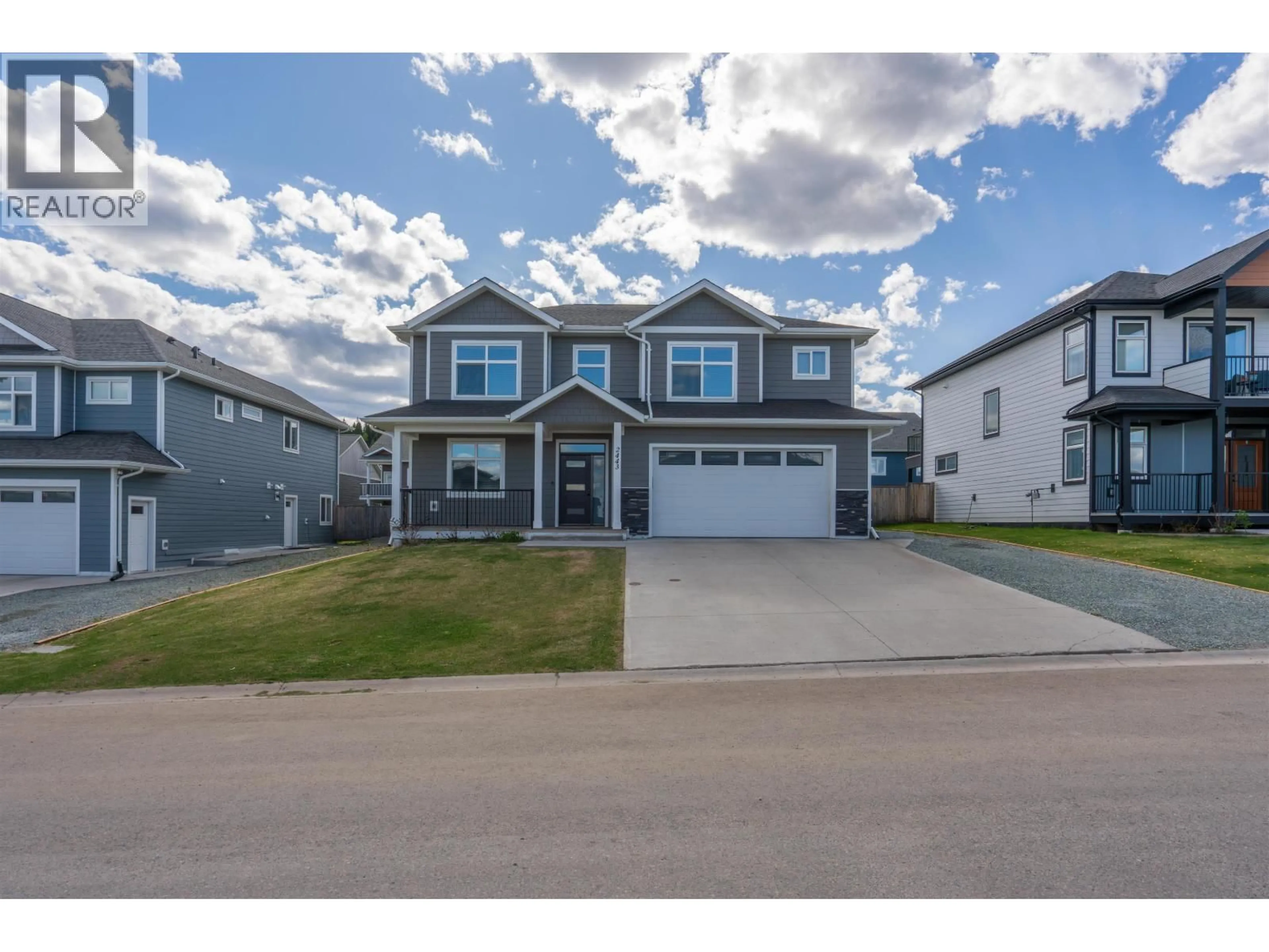 Home with vinyl exterior material, street for 2443 ROWE STREET, Prince George British Columbia V2N0B9