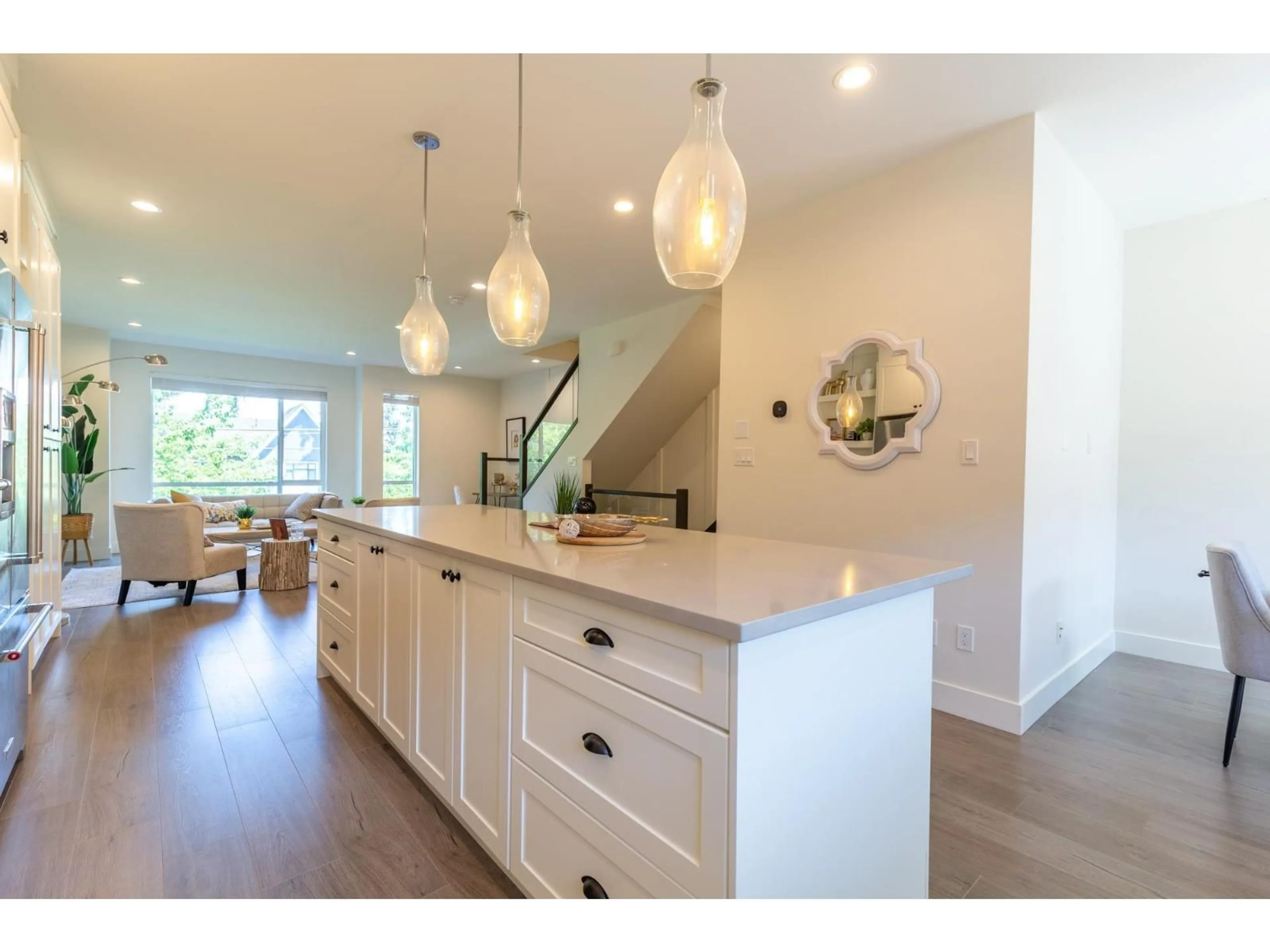 Open concept kitchen, wood/laminate floor for 7 - 15688 28 AVENUE, Surrey British Columbia V3Z0N1