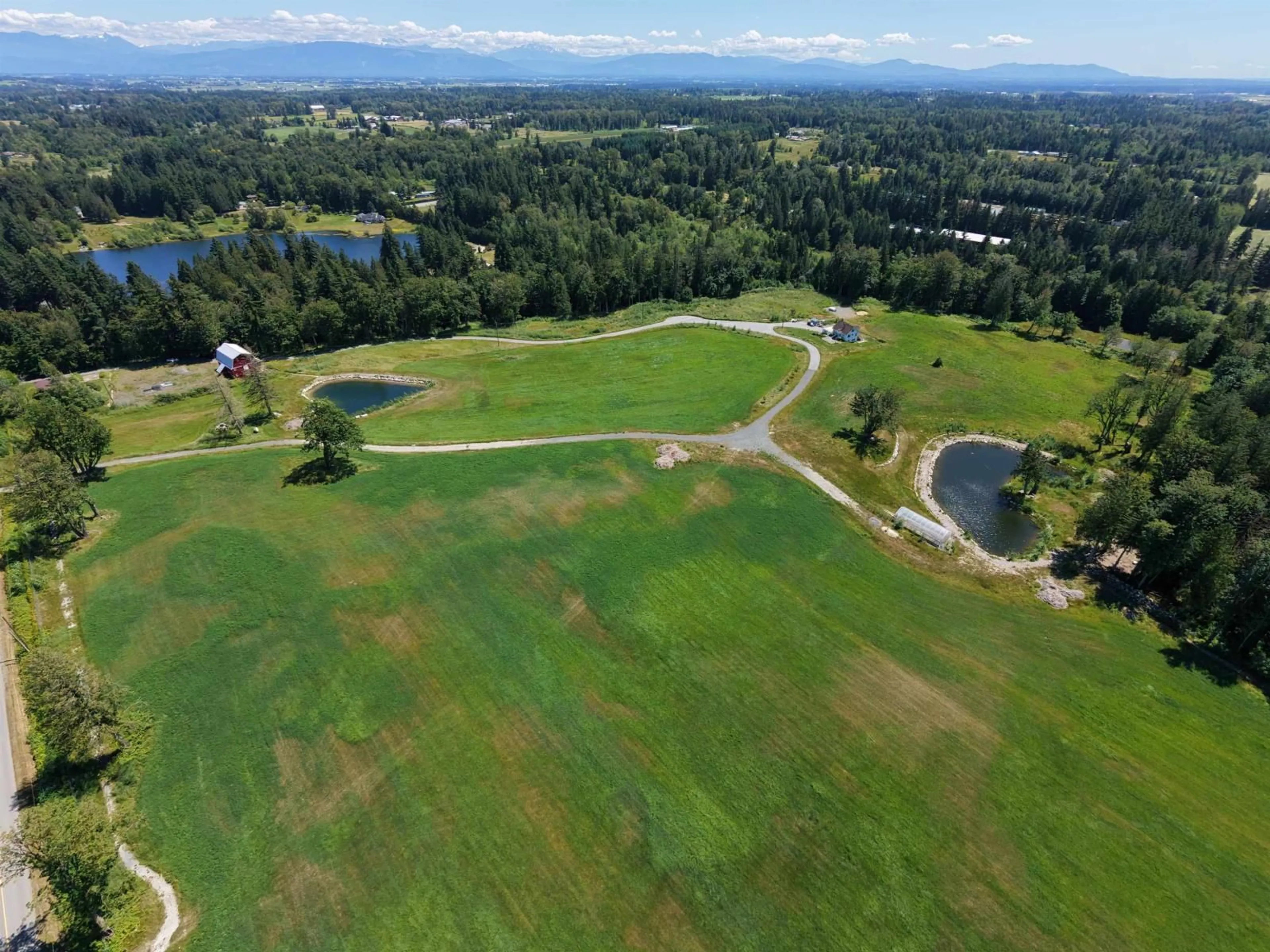 A pic from outside/outdoor area/front of a property/back of a property/a pic from drone, water/lake/river/ocean view for 23186 8 AVENUE, Langley British Columbia V2Z2W3