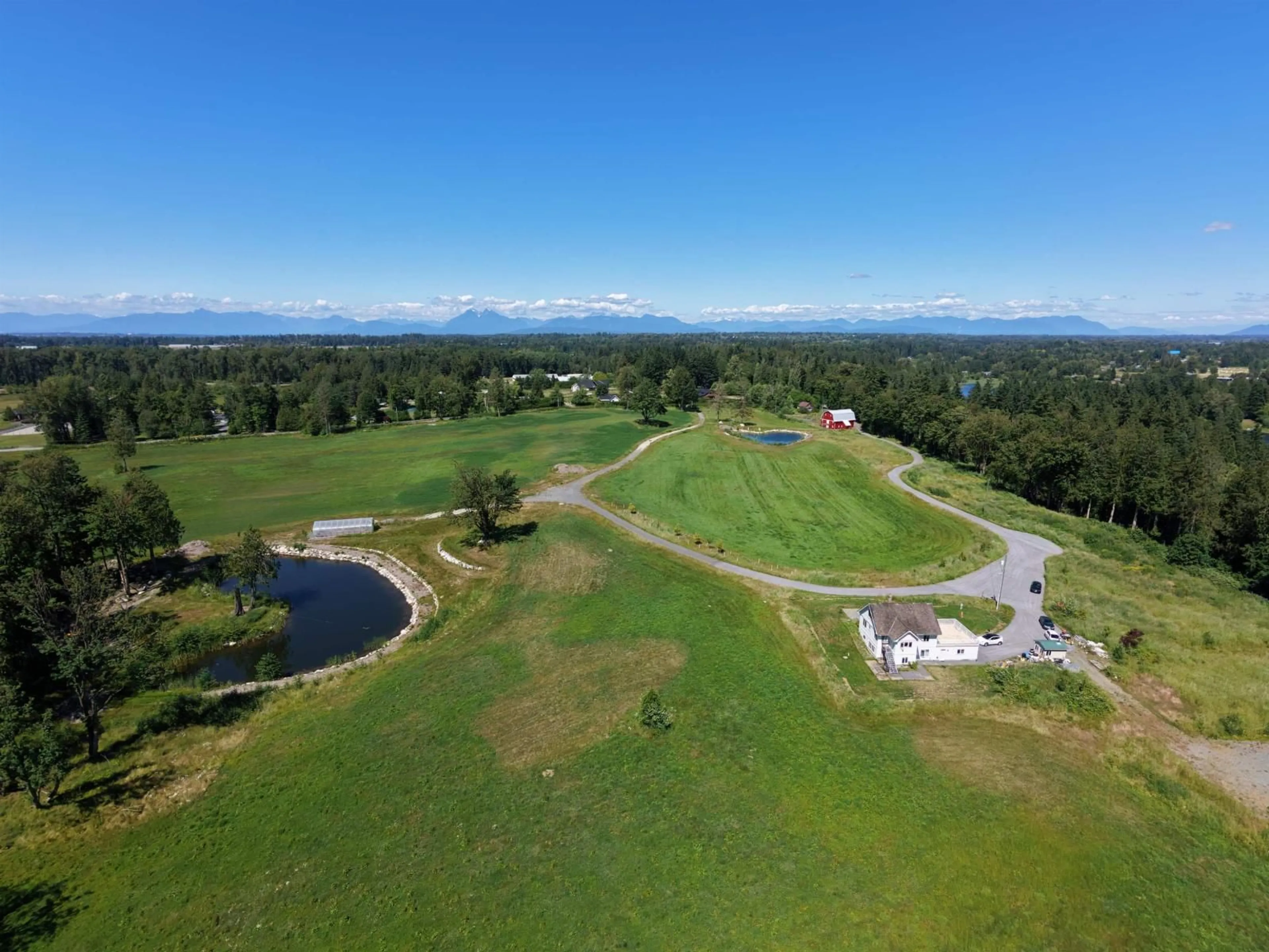 A pic from outside/outdoor area/front of a property/back of a property/a pic from drone, mountain view for 23186 8 AVENUE, Langley British Columbia V2Z2W3