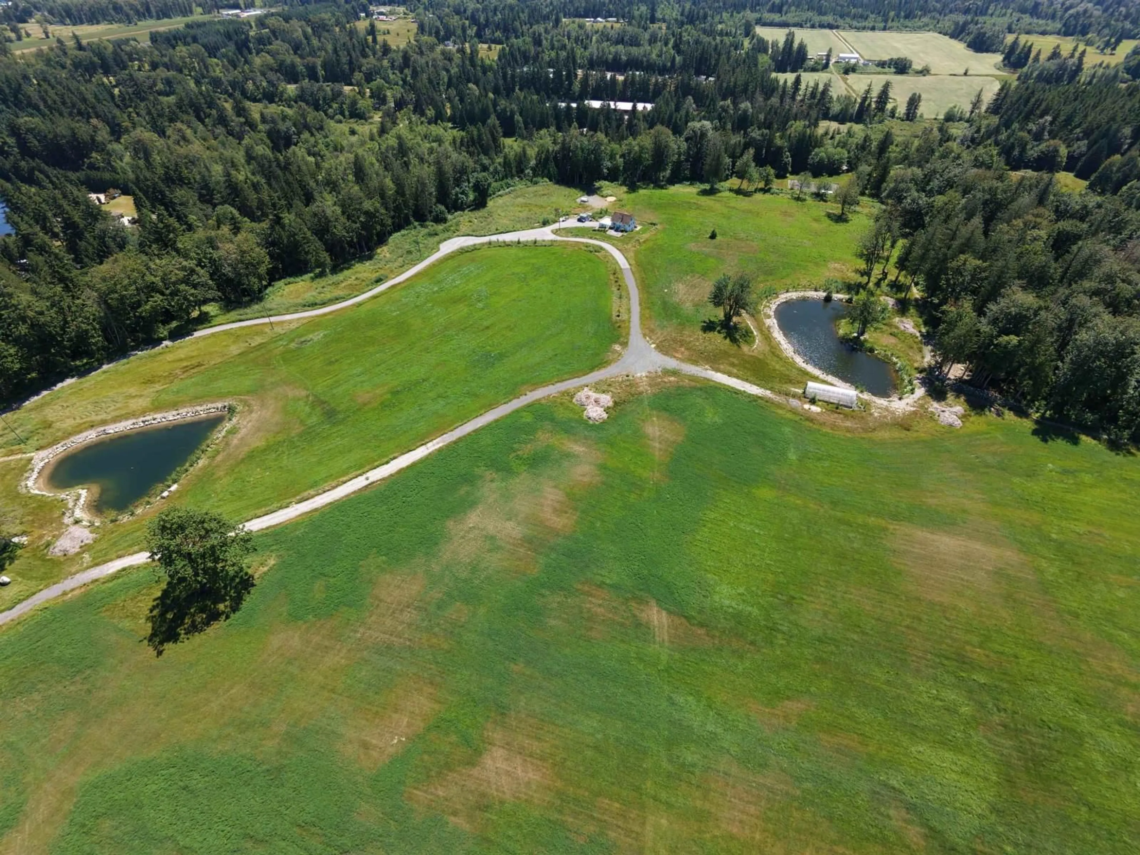 A pic from outside/outdoor area/front of a property/back of a property/a pic from drone, water/lake/river/ocean view for 23186 8 AVENUE, Langley British Columbia V2Z2W3