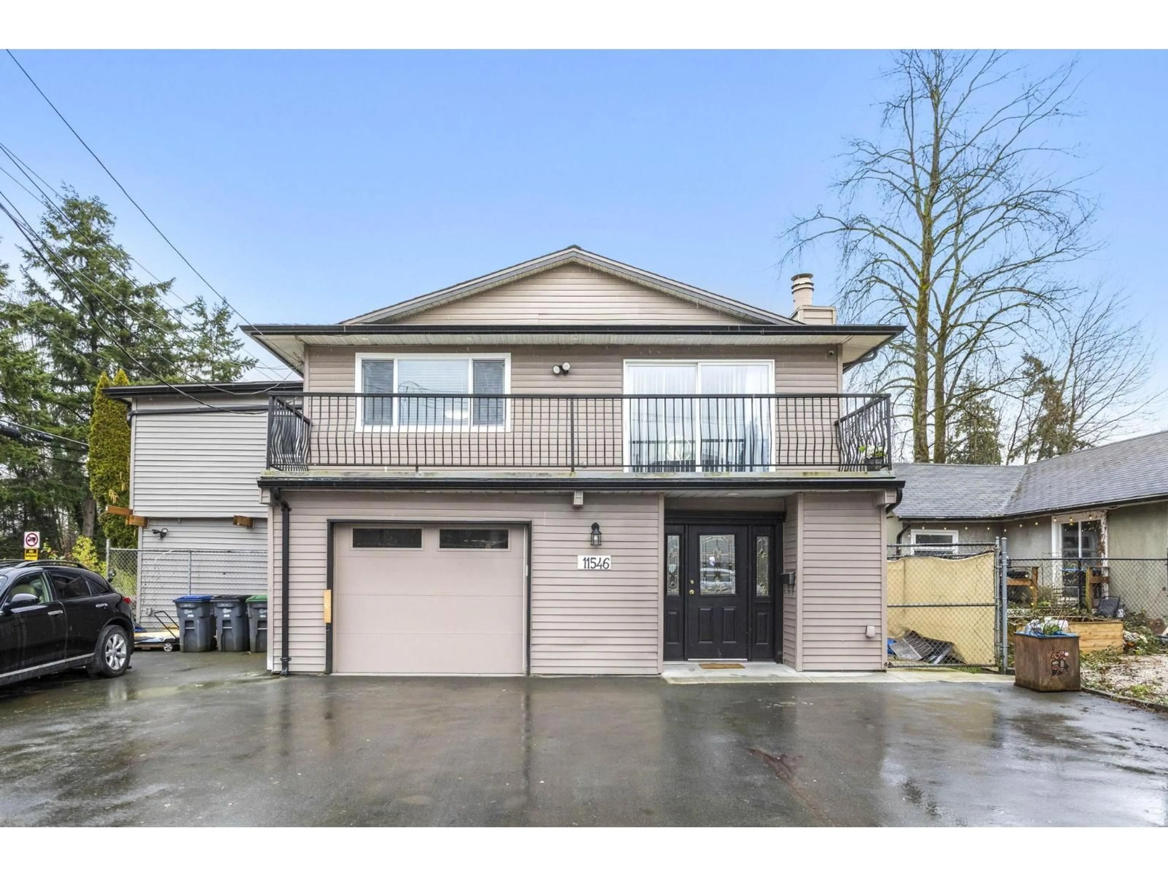 Home with vinyl exterior material, street for 11546 128 STREET, Surrey British Columbia V3R2X6