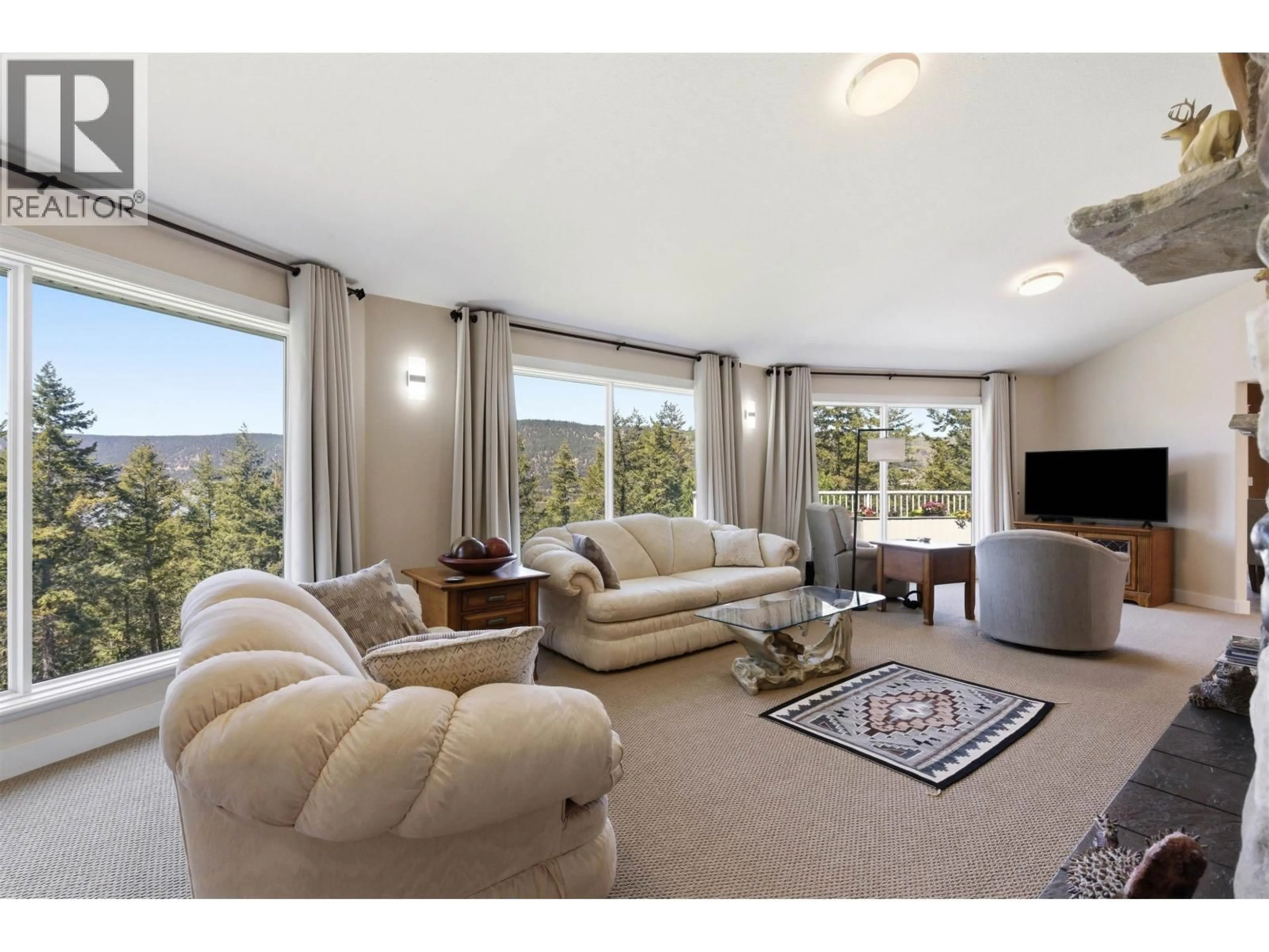 Living room with furniture, unknown for 2104 AQUA VIEW PLACE, Williams Lake British Columbia V2G5G2