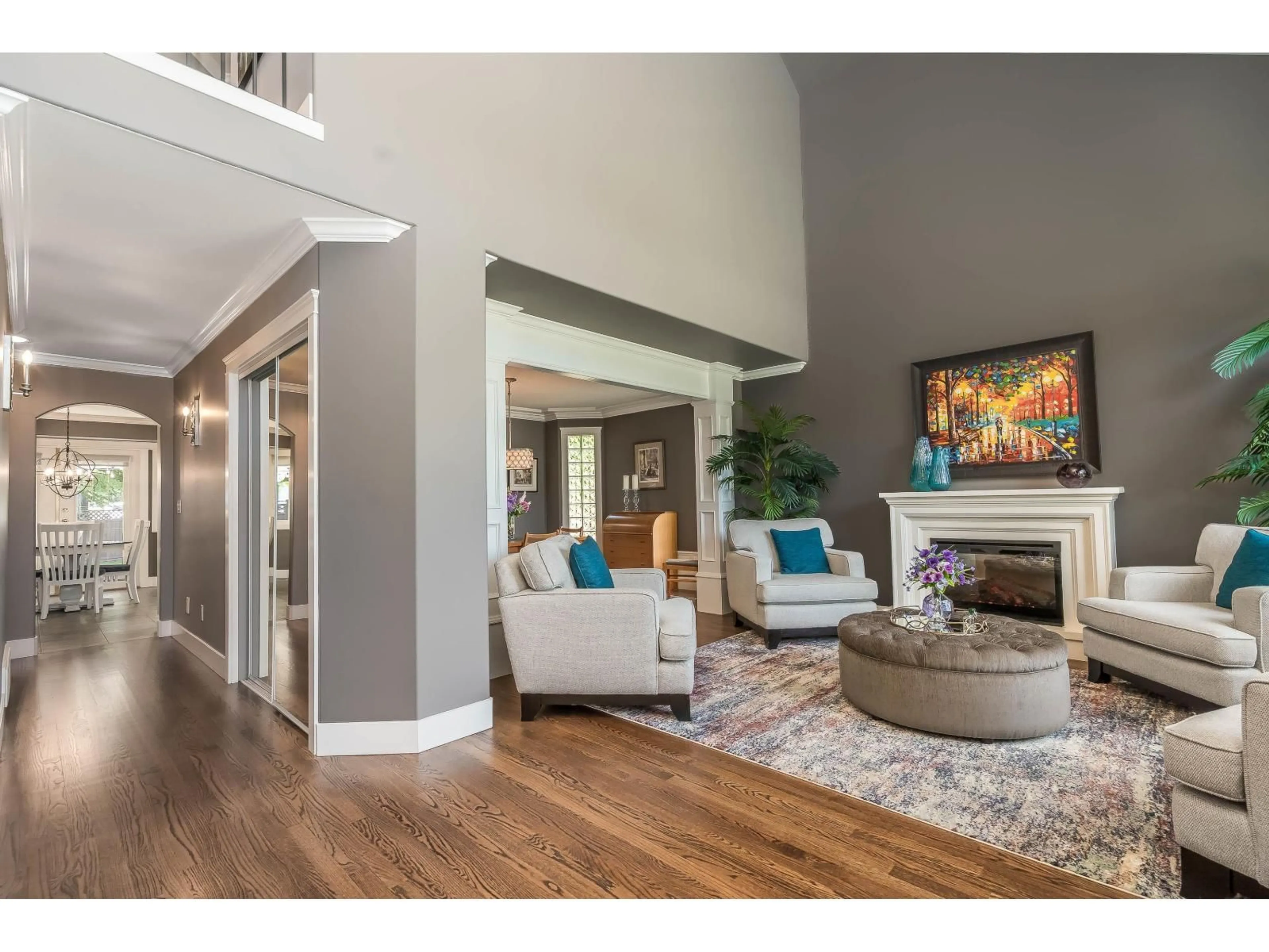 Living room with furniture, wood/laminate floor for 10155 171A STREET, Surrey British Columbia V4N3L3