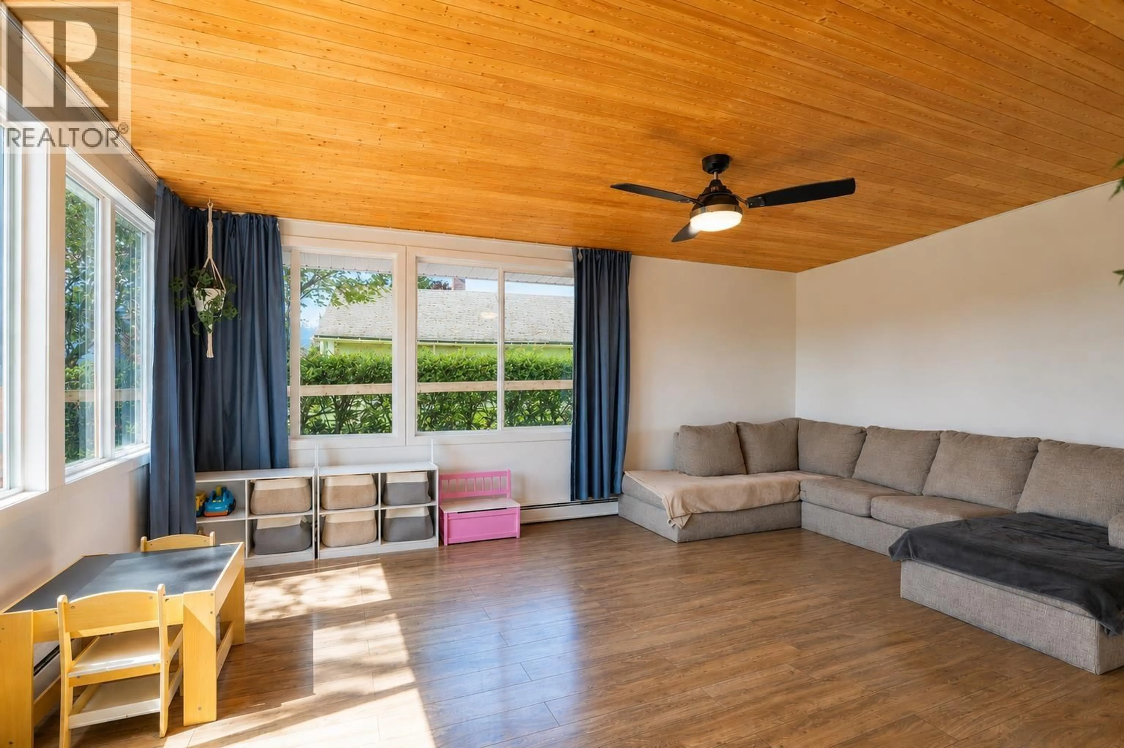 Living room with furniture, wood/laminate floor for 87 SWANNELL STREET, Kitimat British Columbia V8C1H2